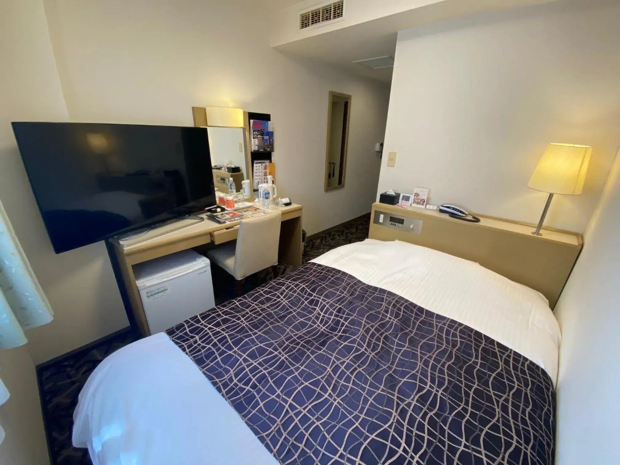 Bed in APA Hotel Isehara-Ekimae Bed in APA Hotel Isehara-Ekimae