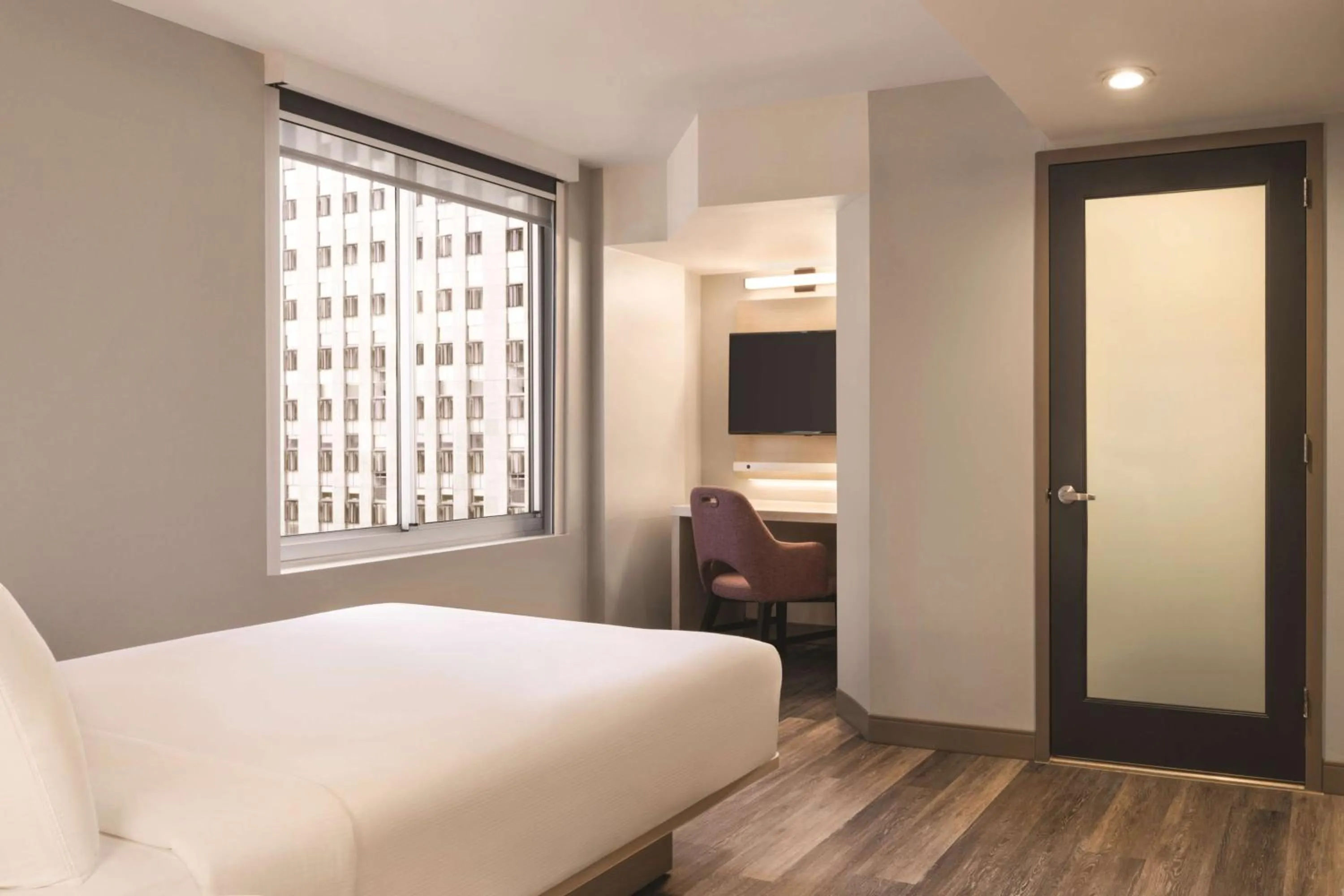 Bed in DoubleTree by Hilton New York Midtown Fifth Ave