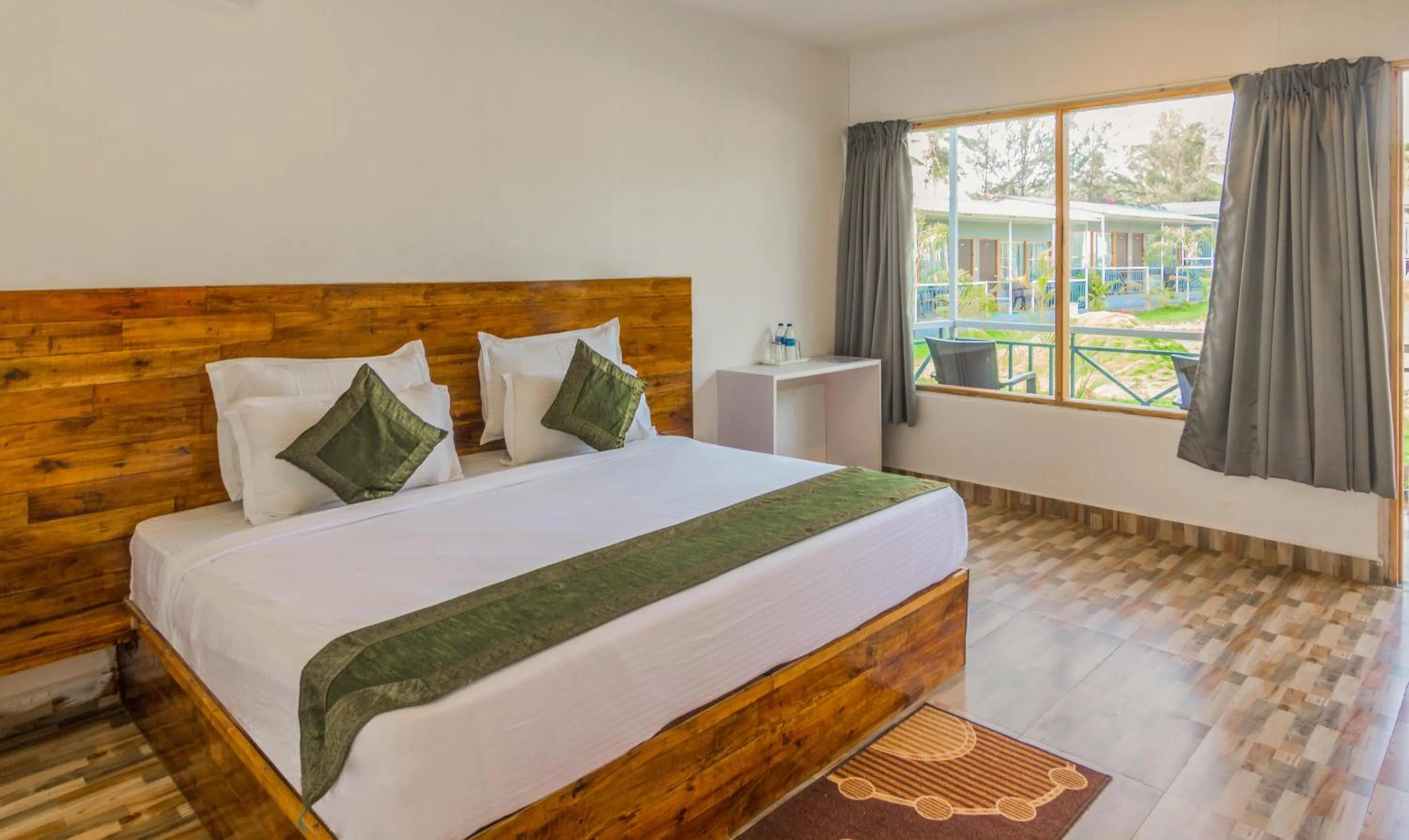 Bed in Treebo Lands End Beach Resort Morjim