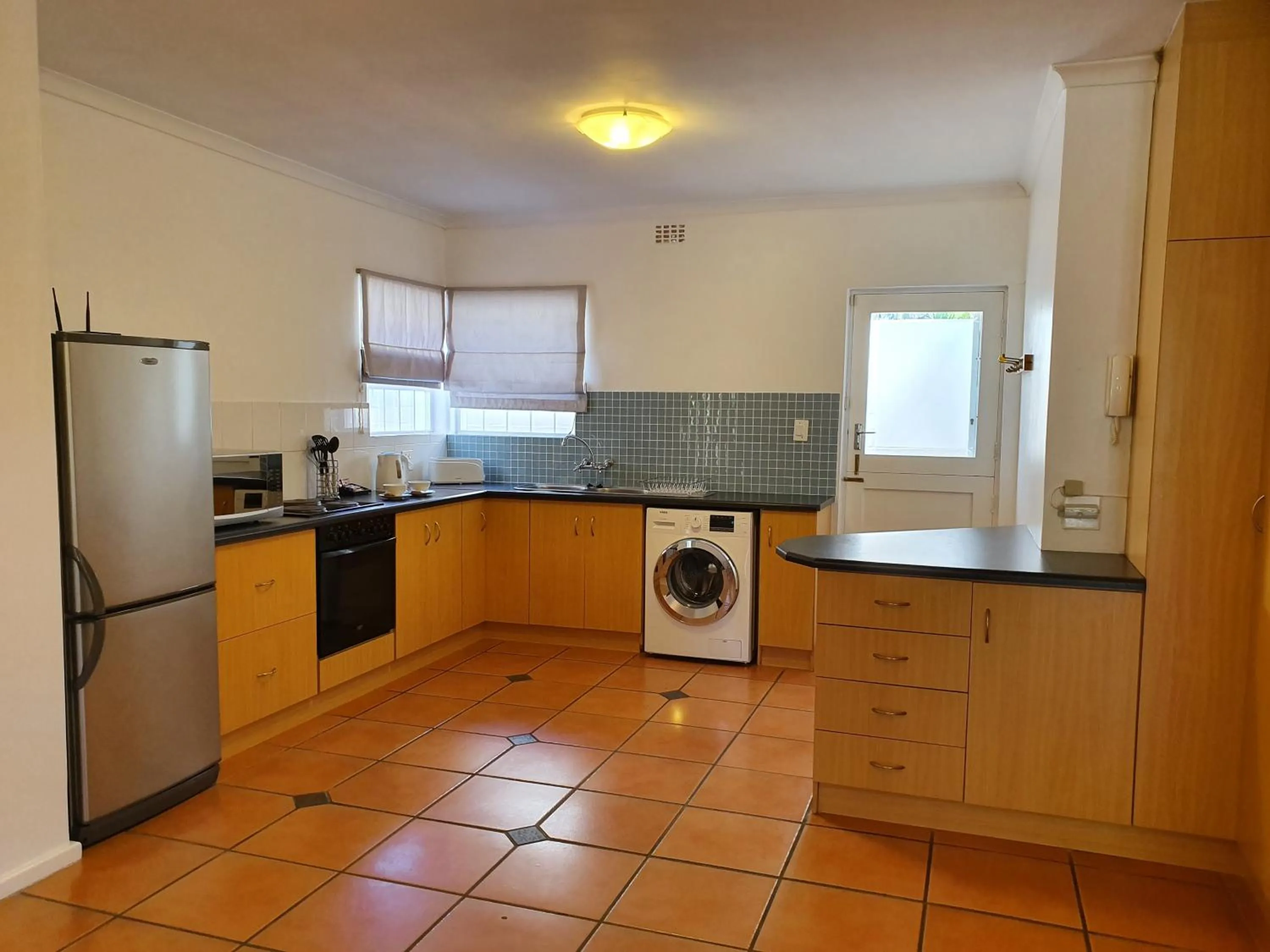 Kitchen or kitchenette in Paradiso Guesthouse & Self-catering Cottage