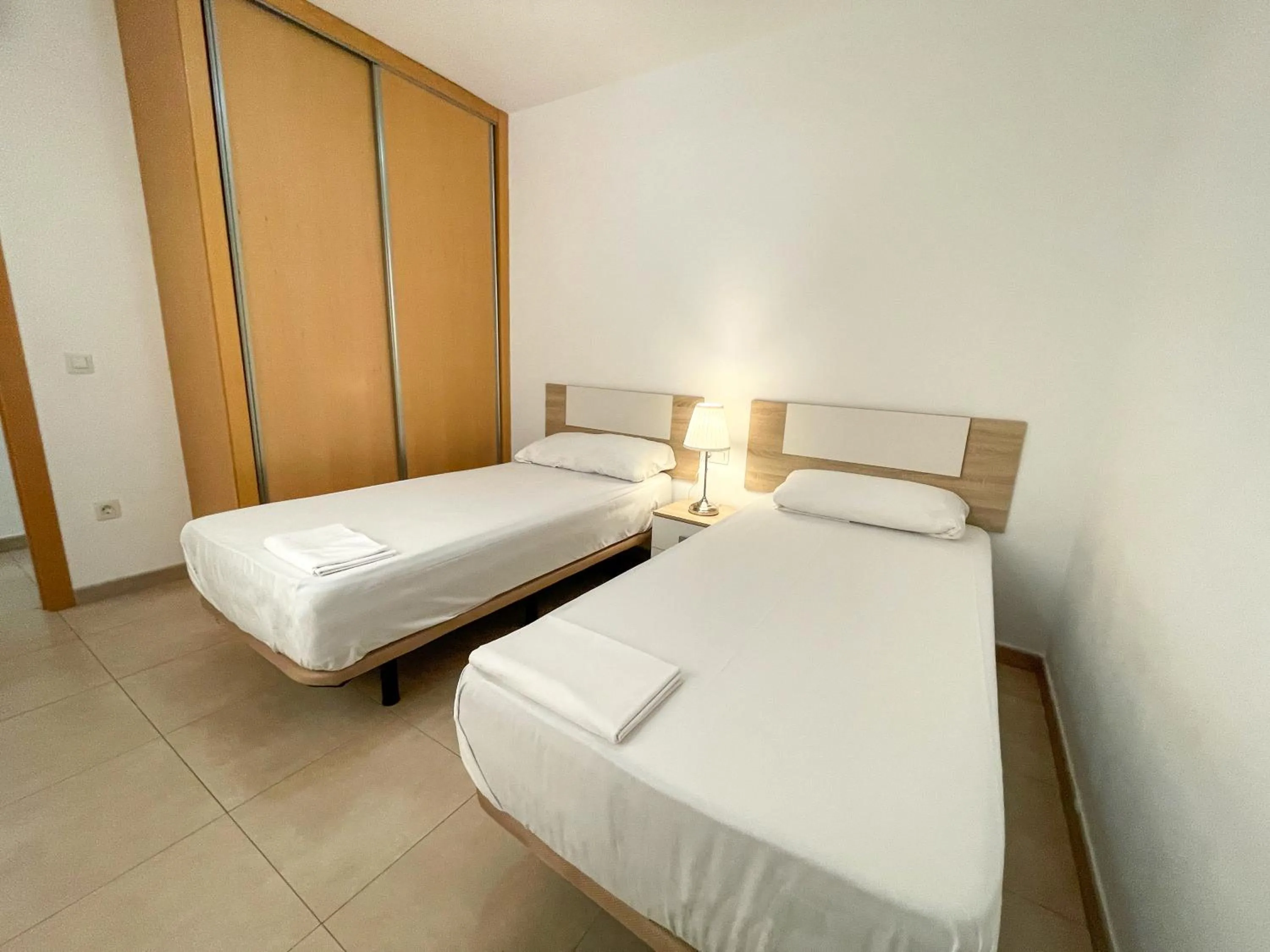 Bed in Apartamentos Neptuno 3000