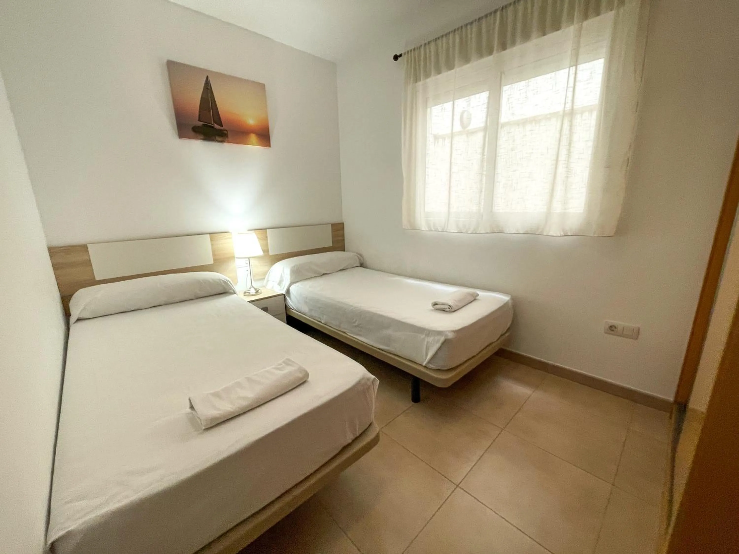 Bed in Apartamentos Neptuno 3000