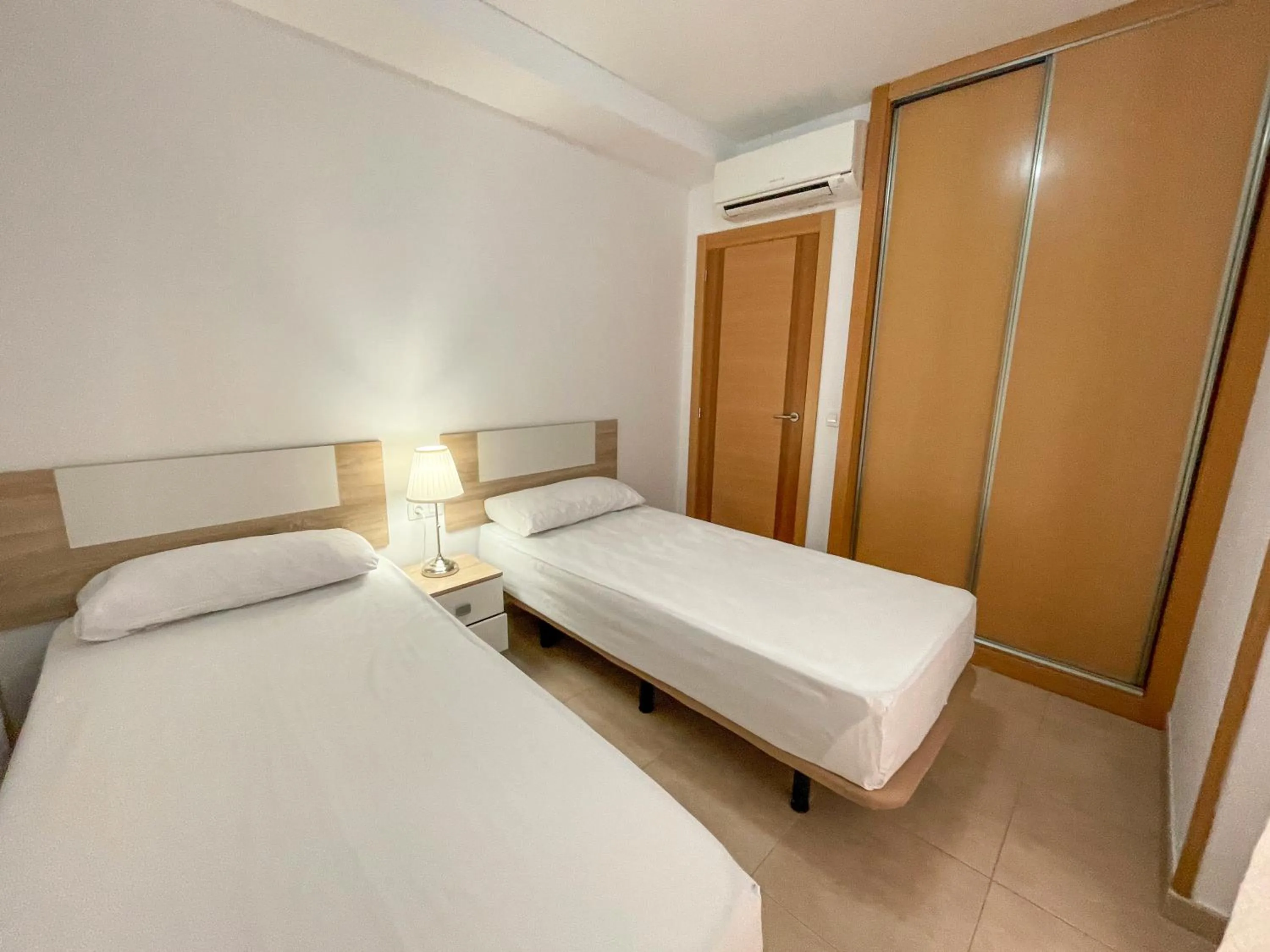 Bed in Apartamentos Neptuno 3000