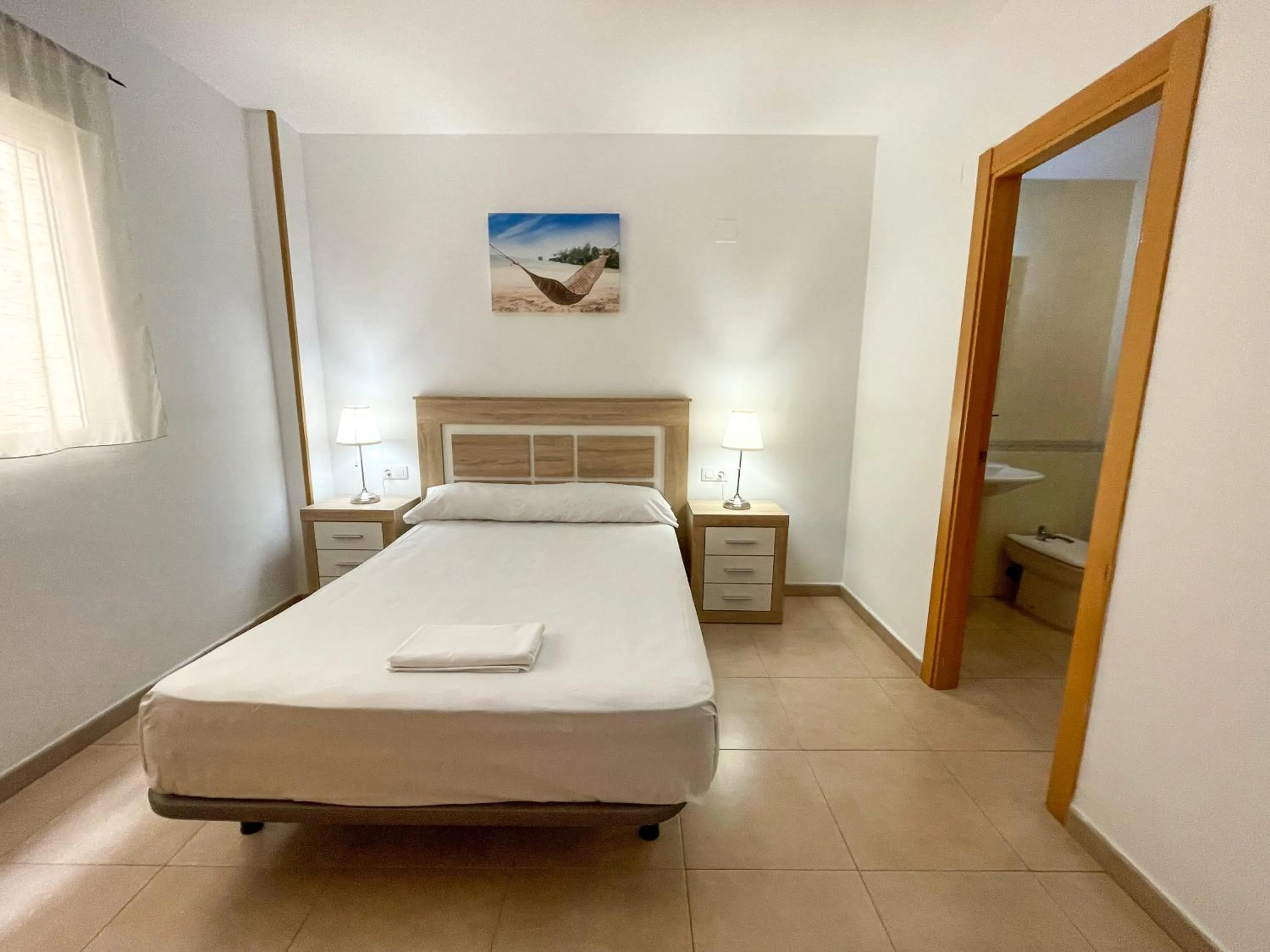 Bed in Apartamentos Neptuno 3000