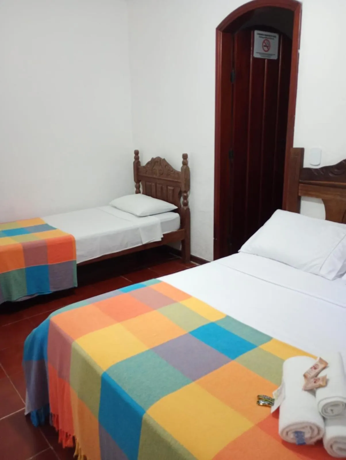 Bed in Pousada Alecrim Dourado