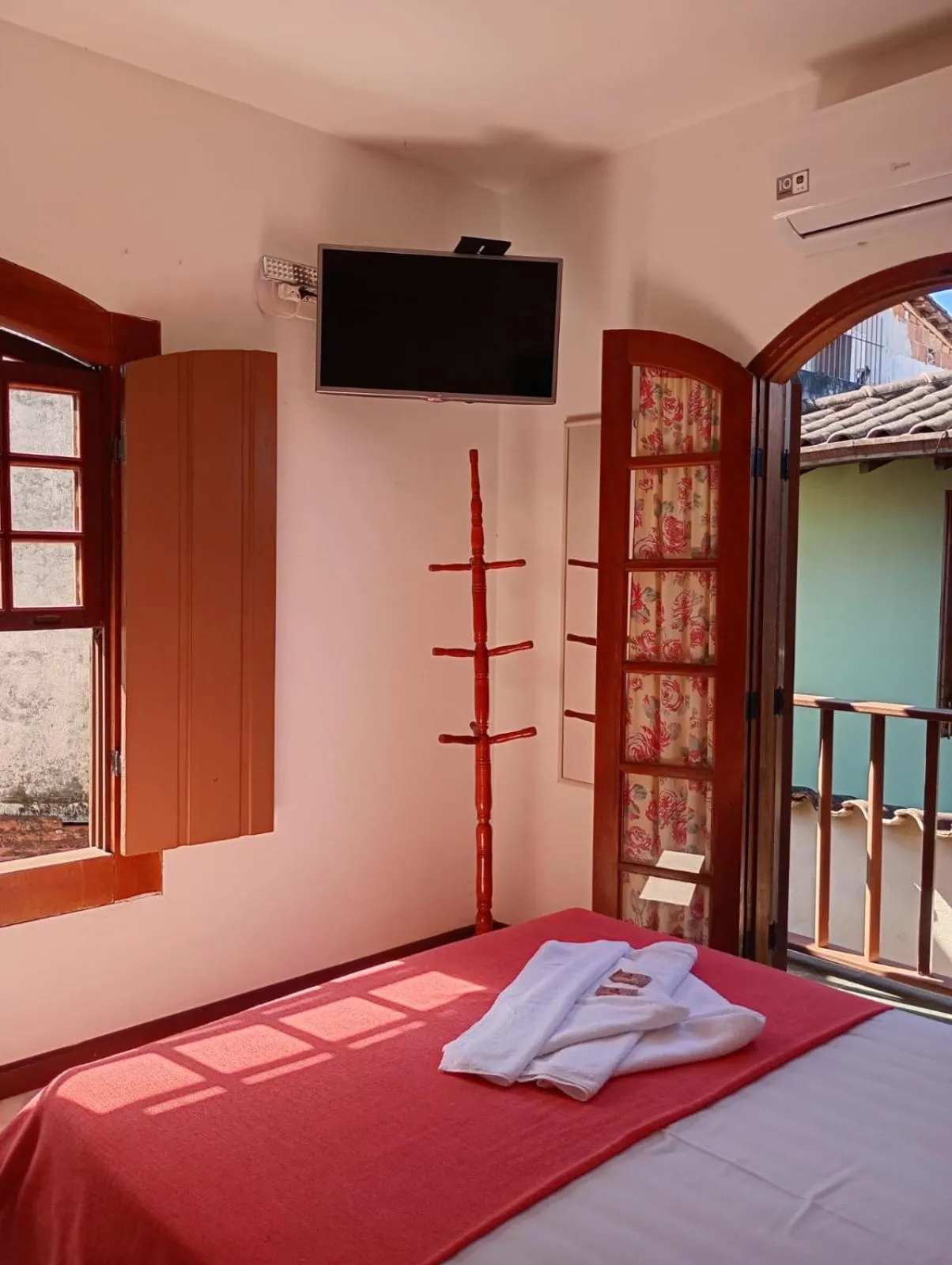 Bed in Pousada Alecrim Dourado