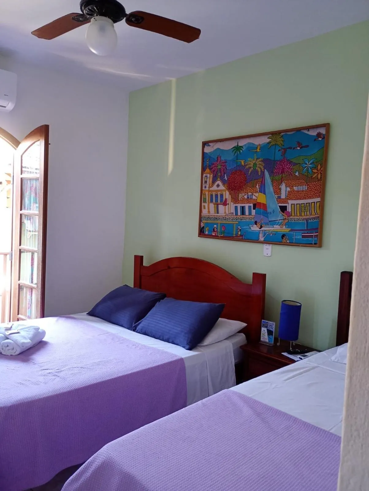 Bed in Pousada Alecrim Dourado