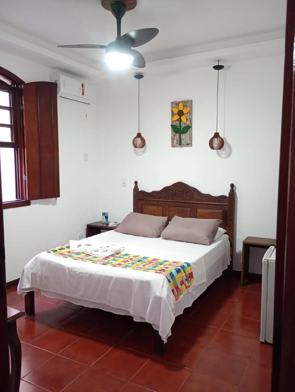 Photo of the whole room, Bed in Pousada Alecrim Dourado