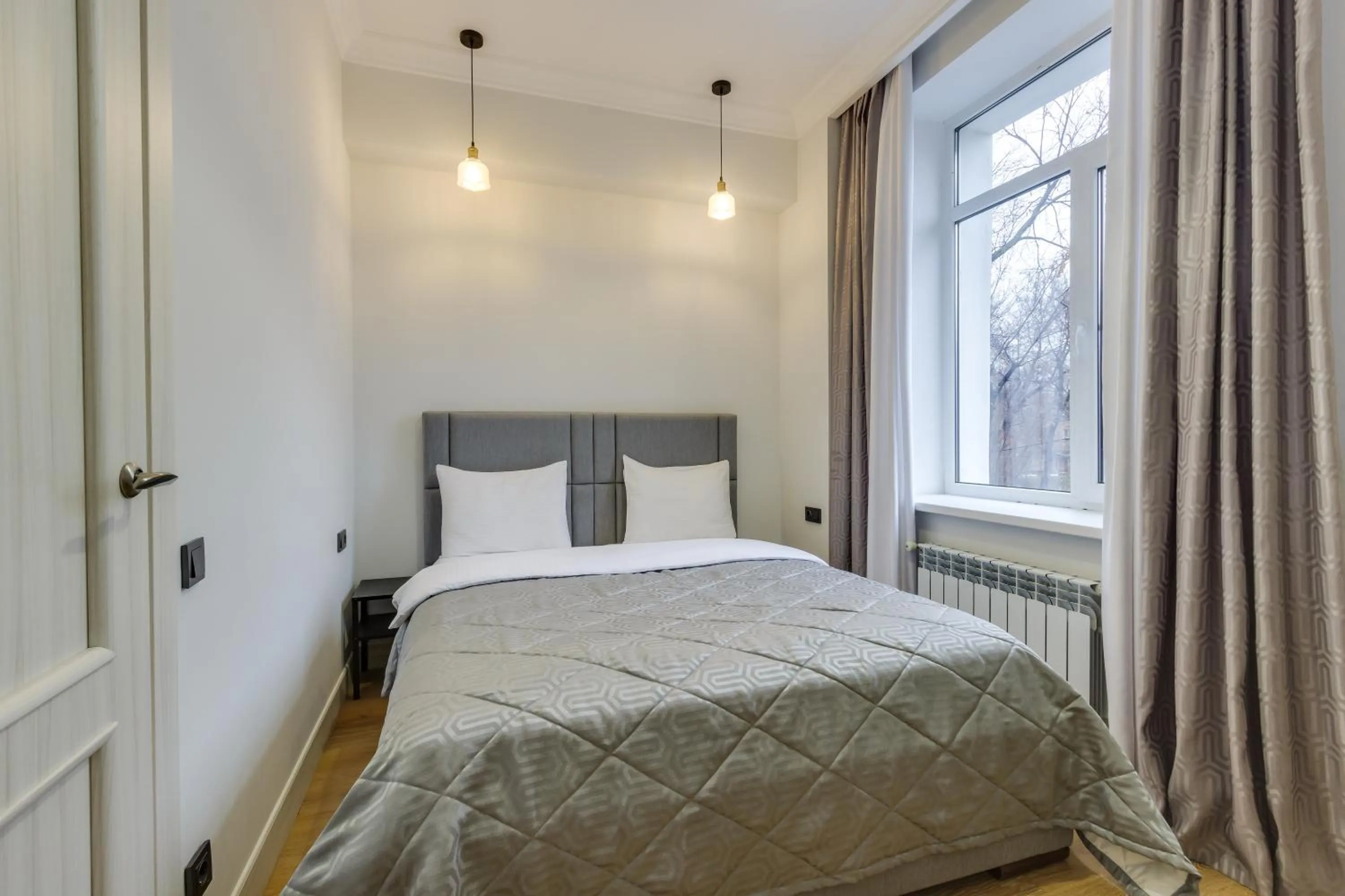 Bedroom, Bed in Opera Apartments Almaty