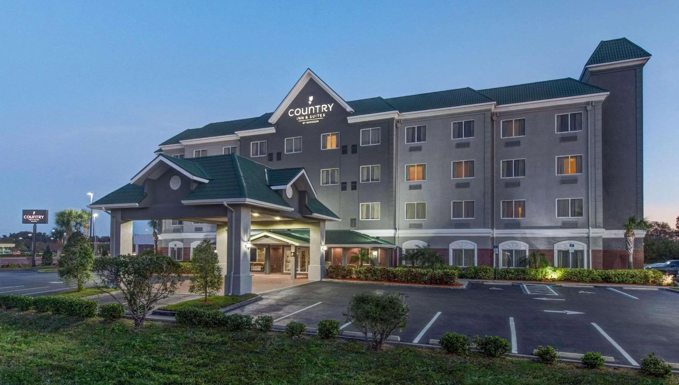 Property building in Country Inn & Suites by Radisson, St Petersburg - Clearwater, FL