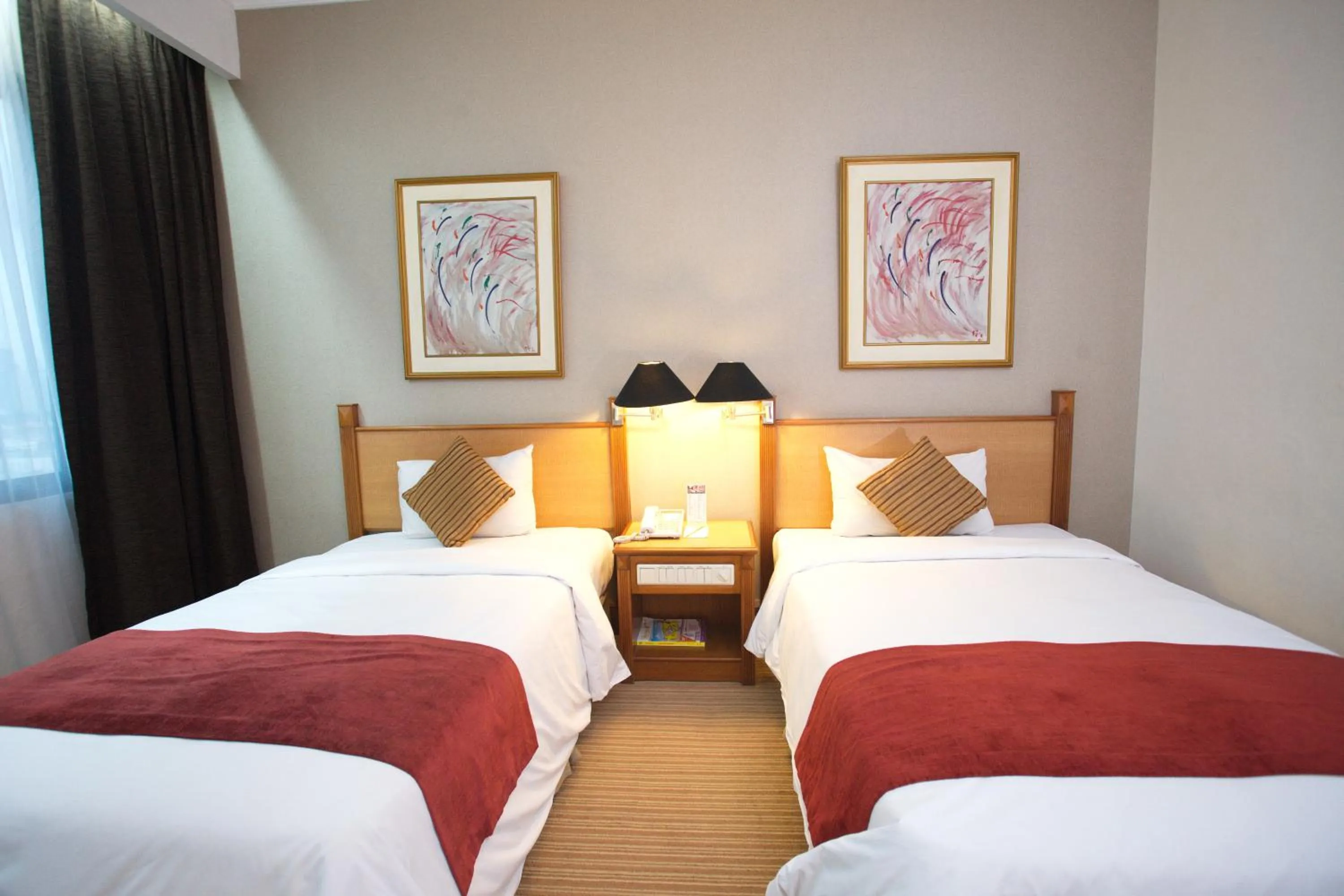 Bed in Menara Peninsula Hotel