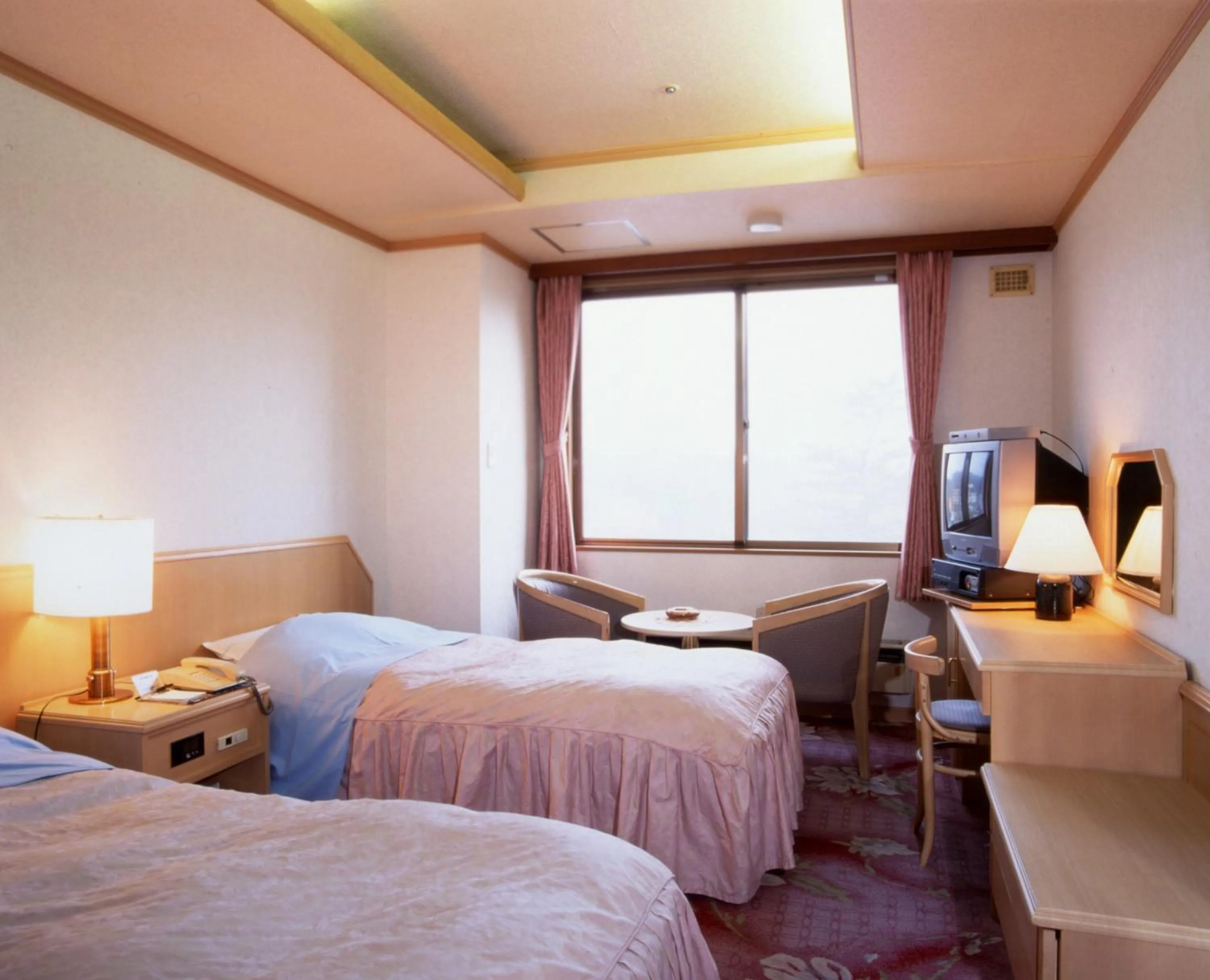 Photo of the whole room, Bed in New Akan Hotel