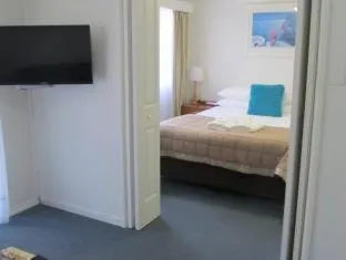 Bed in Costa D'Ora Holiday Apartments