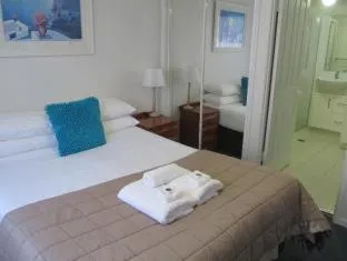 Bed in Costa D'Ora Holiday Apartments