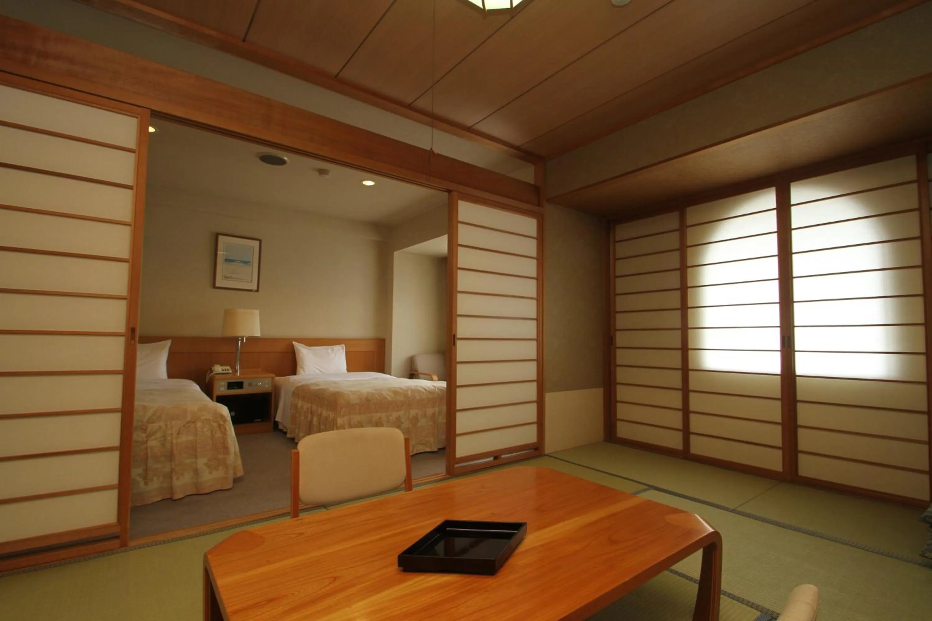 Living room, Bed in Hotel Gozensui