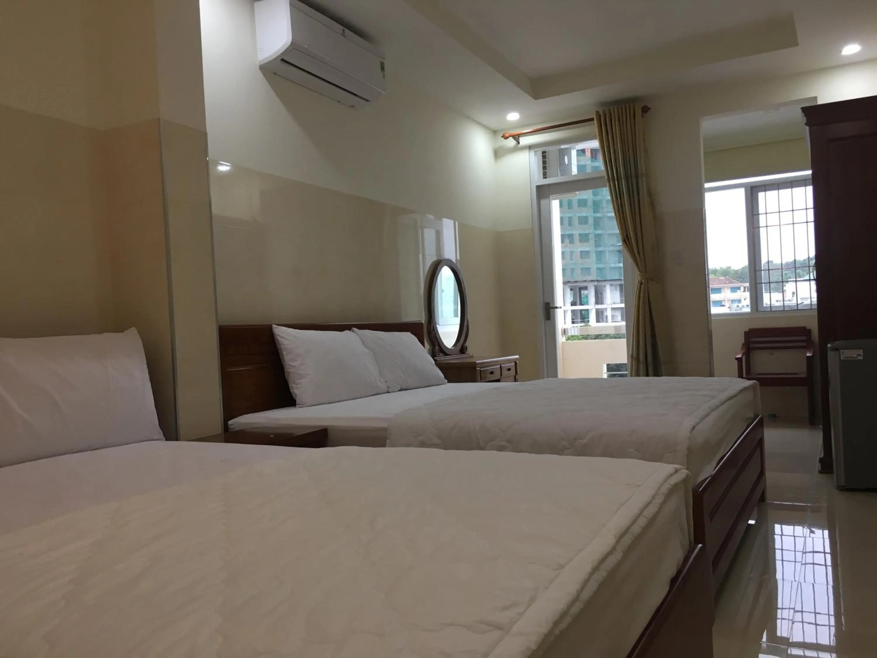 Bed in DUY HUY hotel & apartment