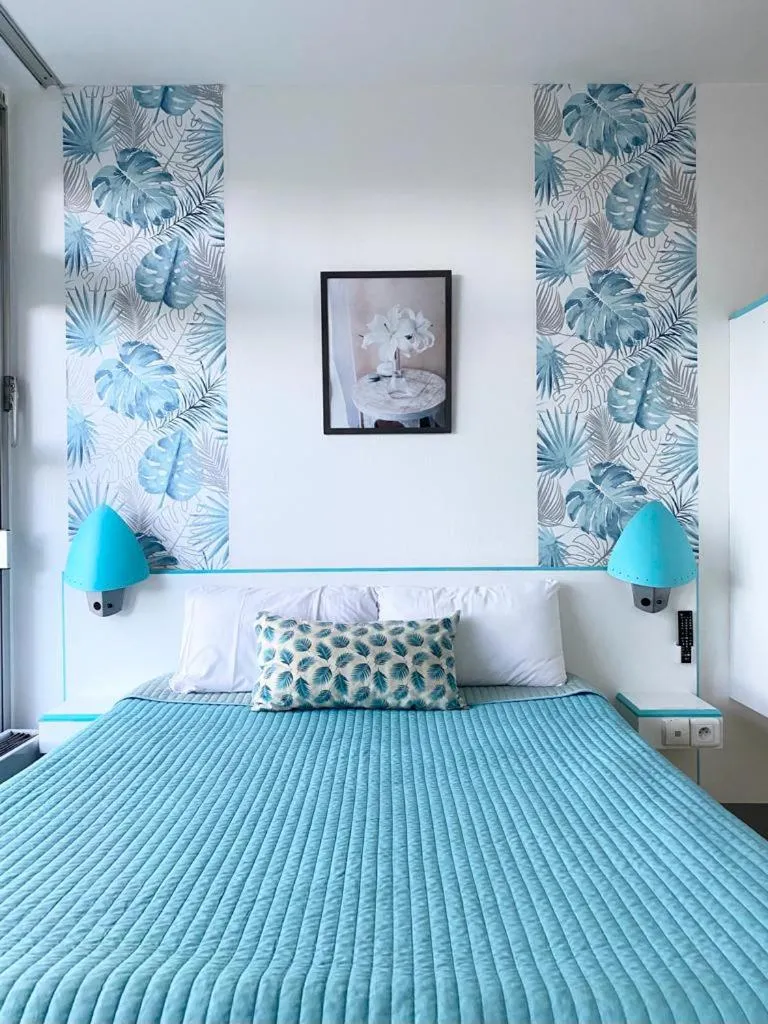 Bed in hotel l'échappée d'oléron