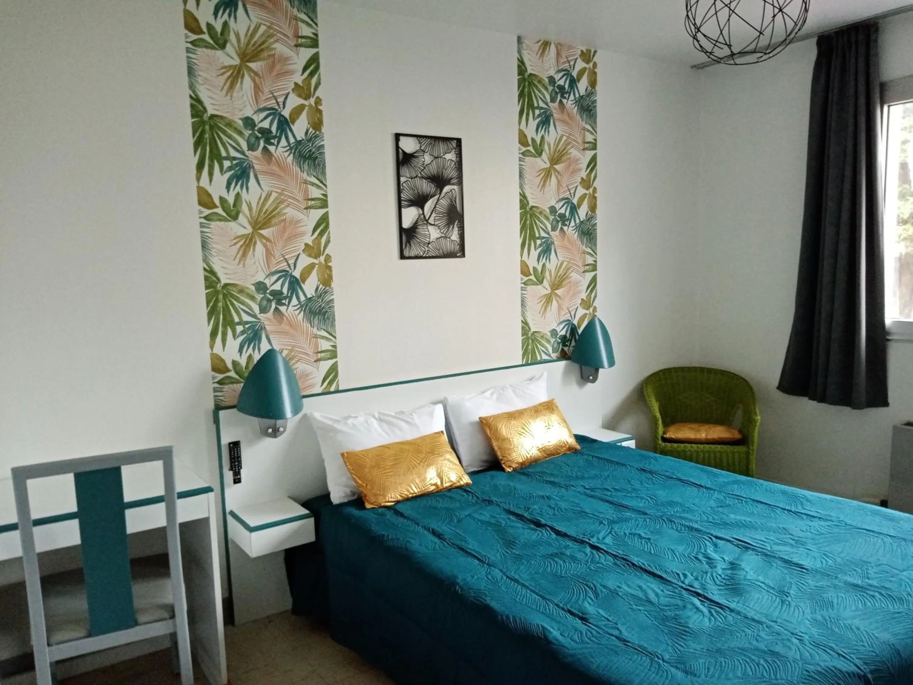 Bed in hotel l'échappée d'oléron