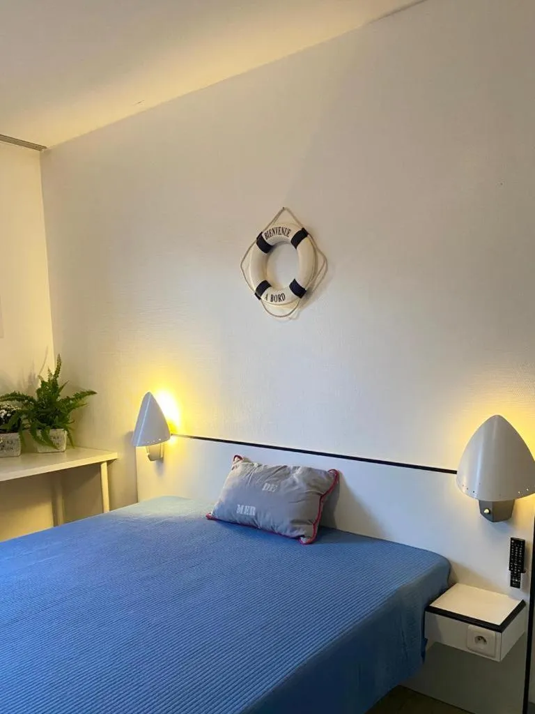 Bed in hotel l'échappée d'oléron