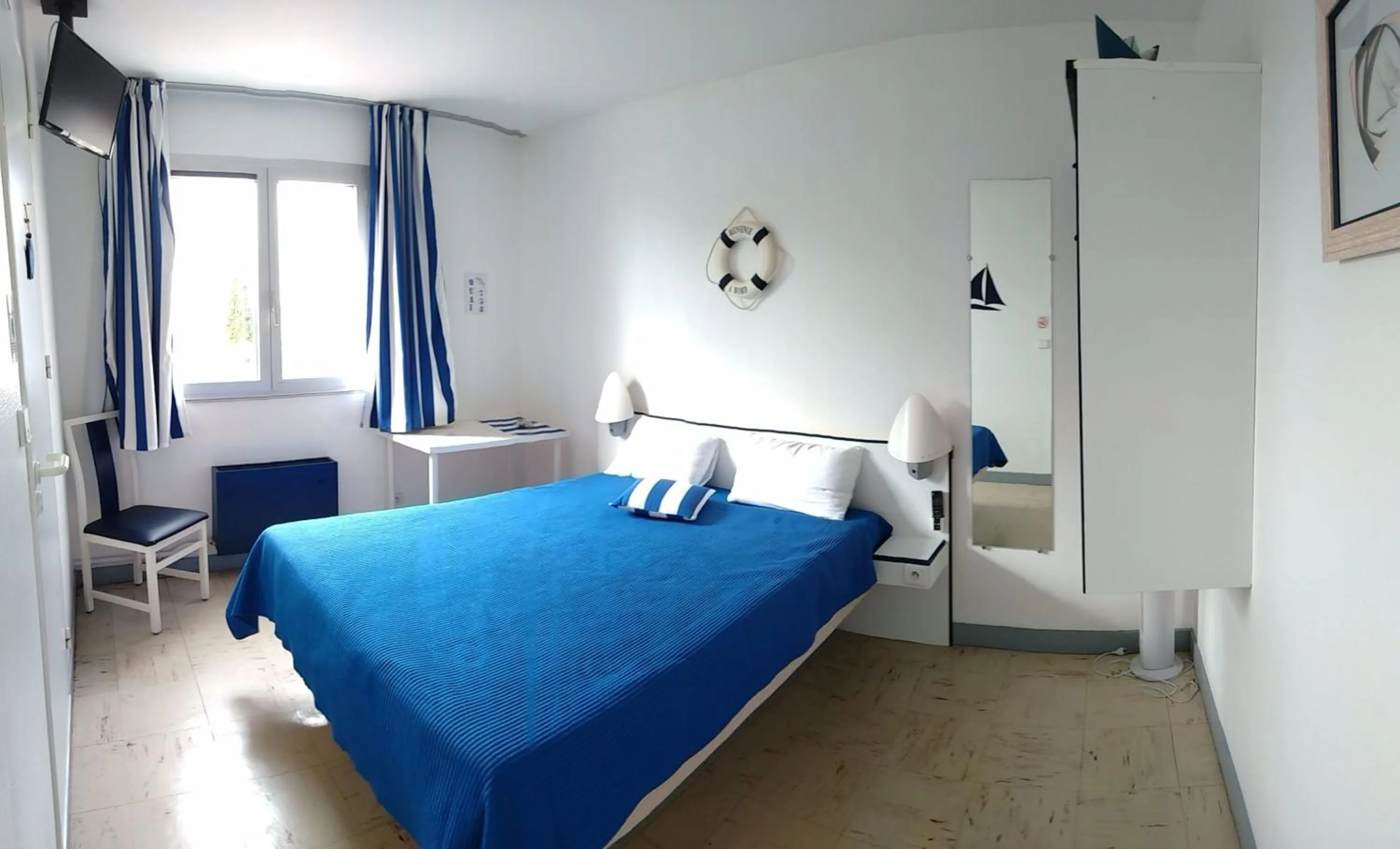 Bed in hotel l'échappée d'oléron