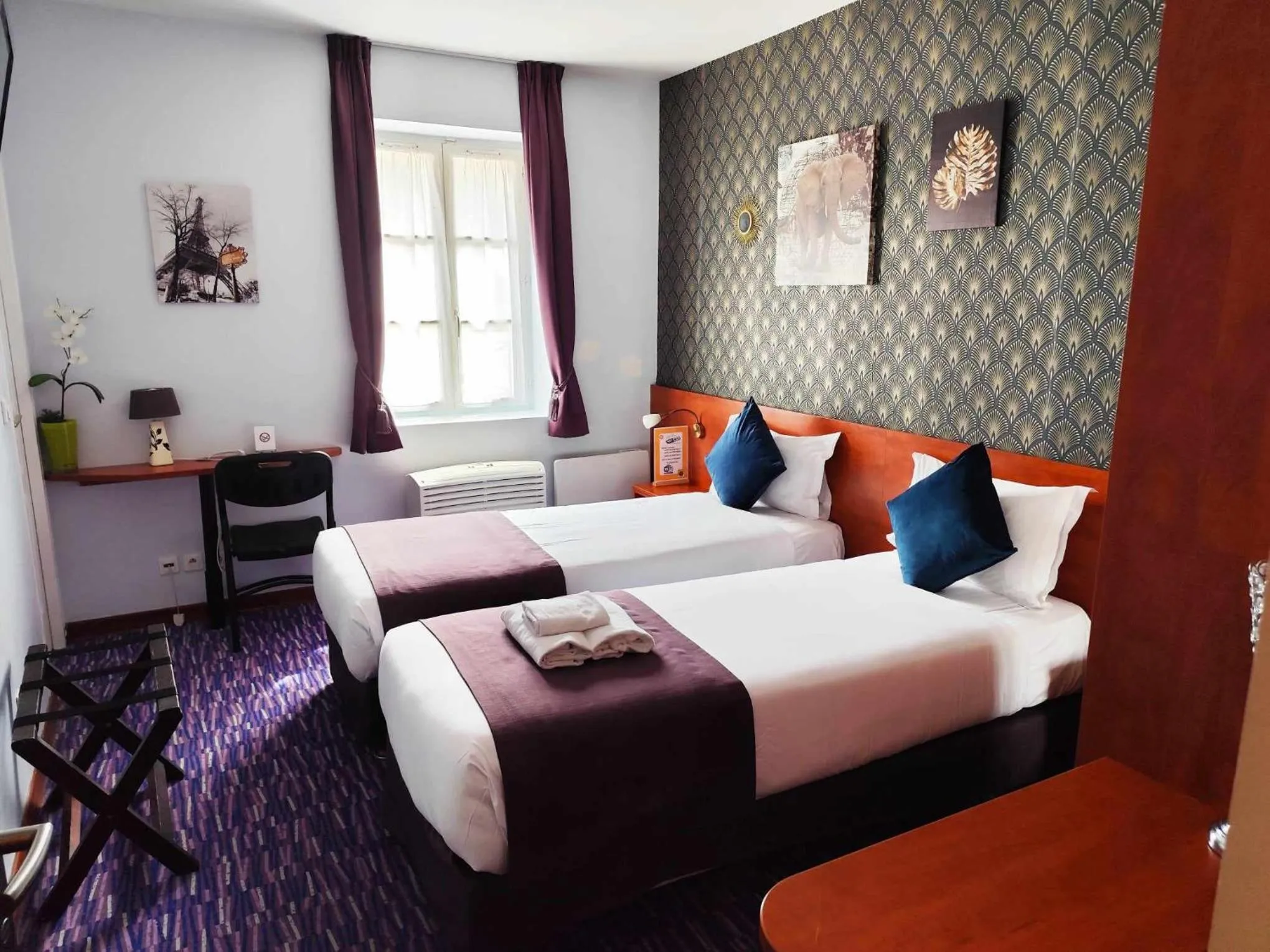 Bed in Hôtel du Fort