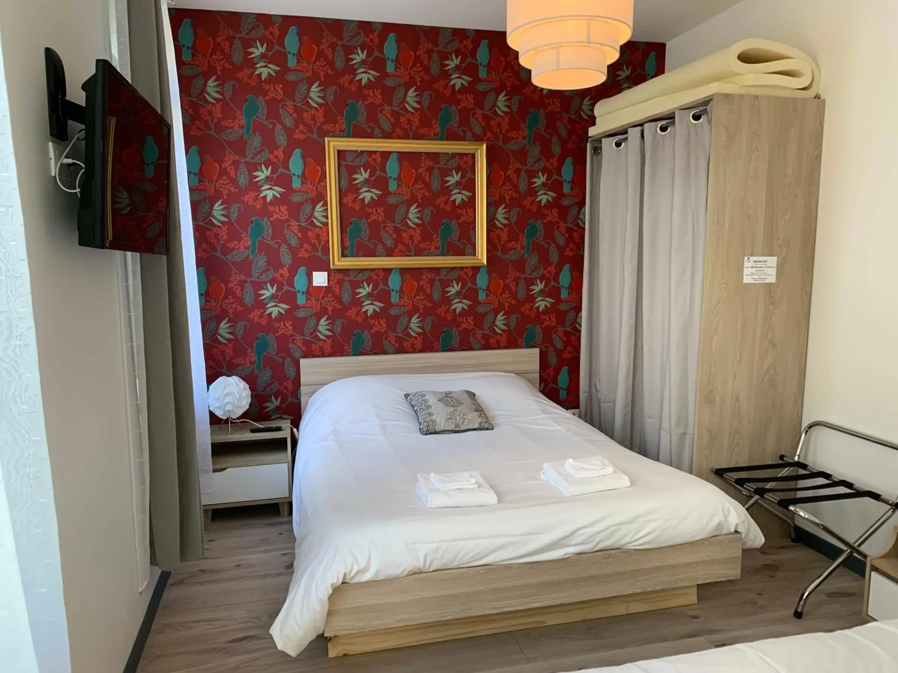 Bed in Trankil'Apparts Centre Bed in Trankil'Apparts Centre