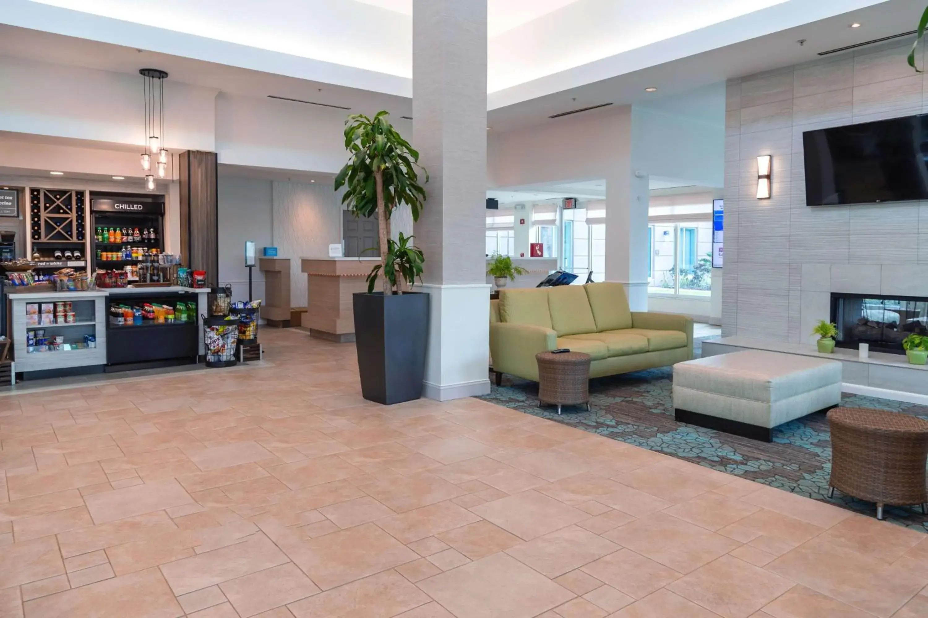 Lobby or reception in Hilton Garden Inn Orlando East - UCF Area Lobby or reception in Hilton Garden Inn Orlando East - UCF Area