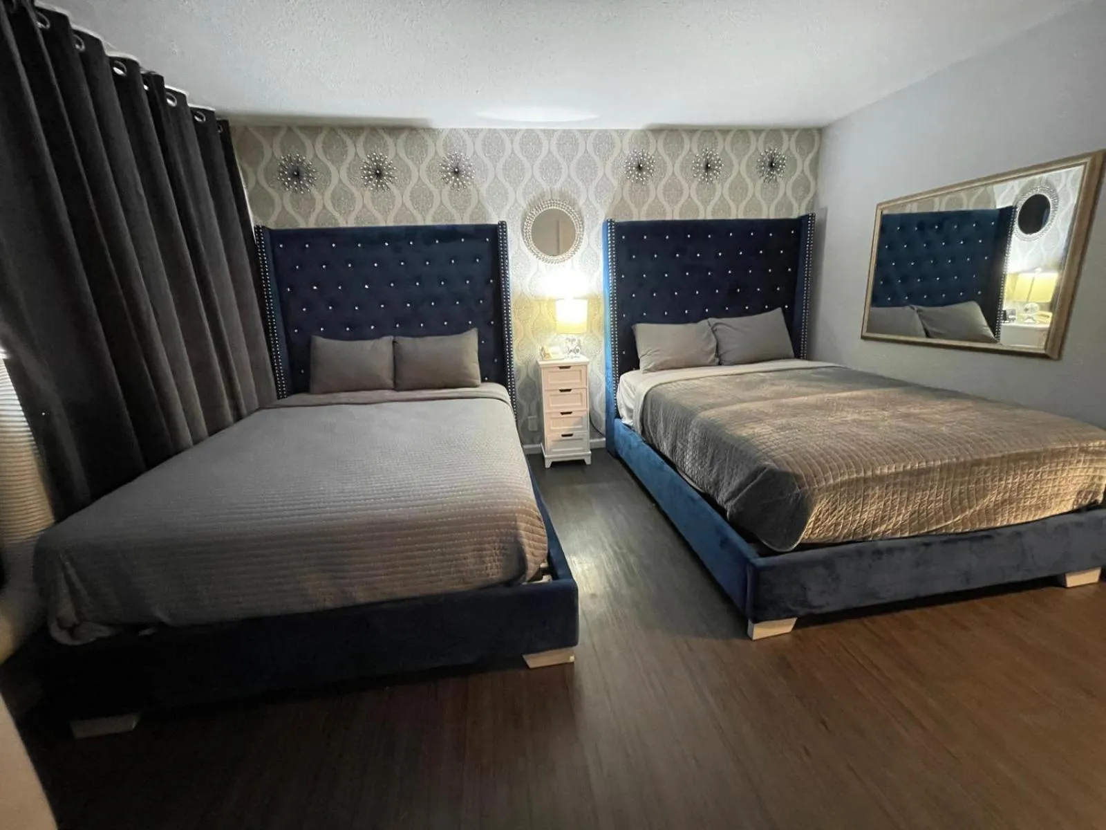 Bed in The Village Inn Hotel