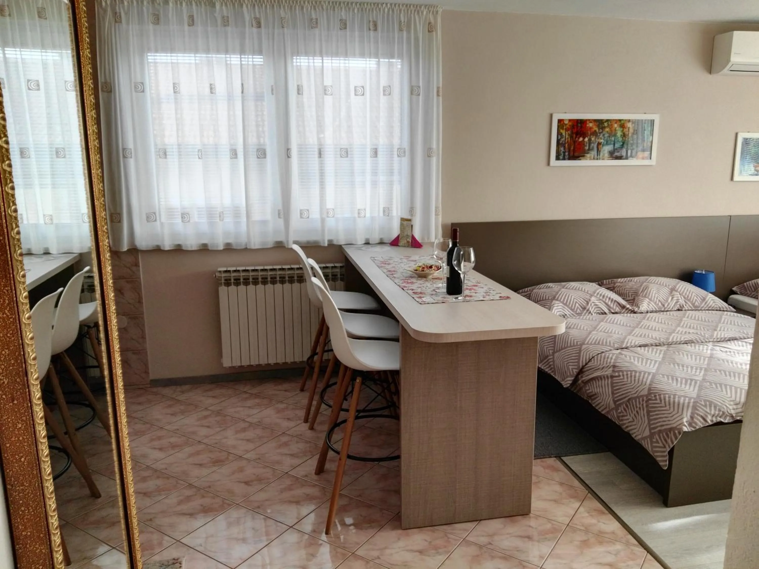Seating area, Bed in Apartmani Janjic