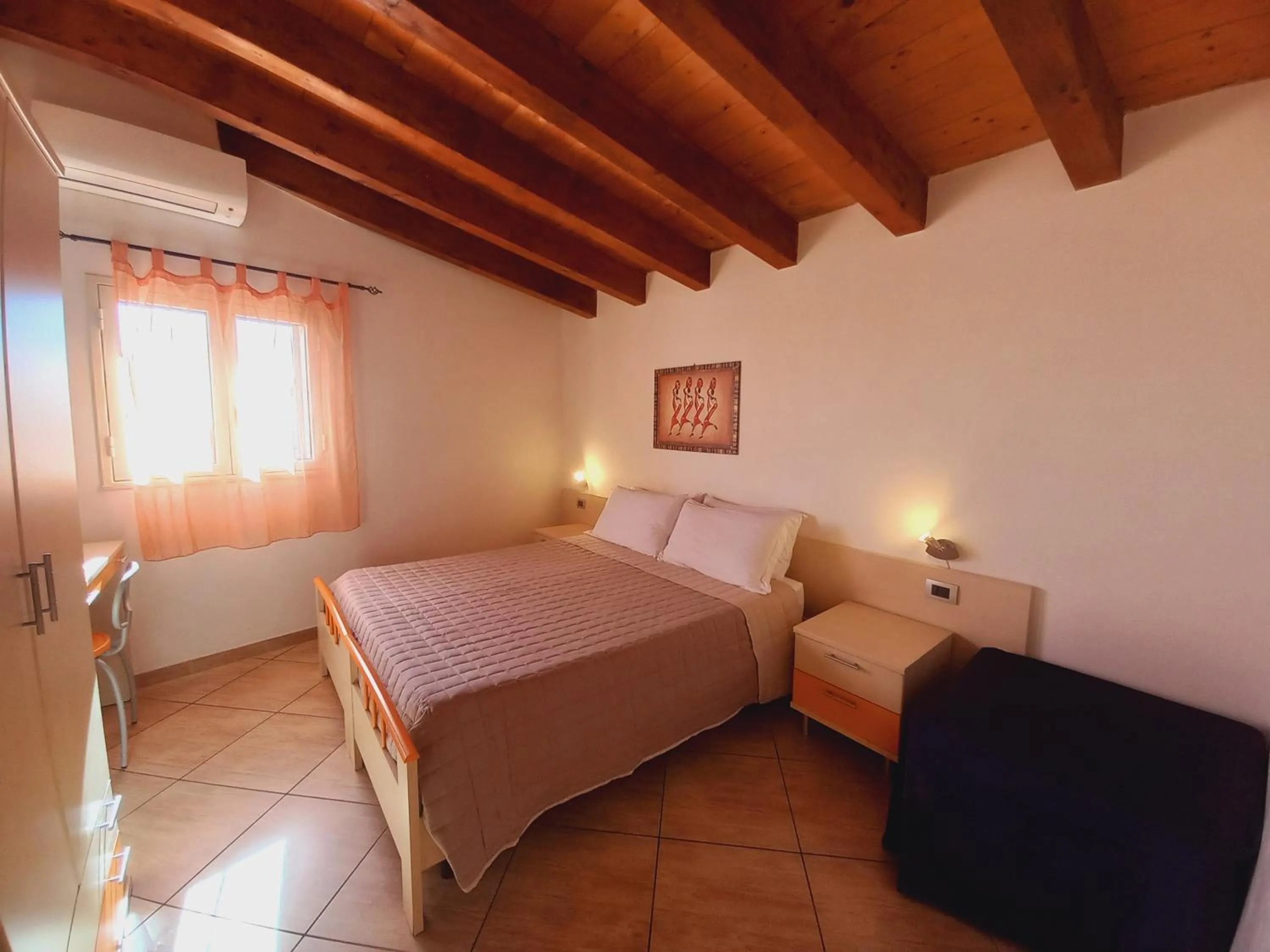 Photo of the whole room, Bed in L'Antica Torre