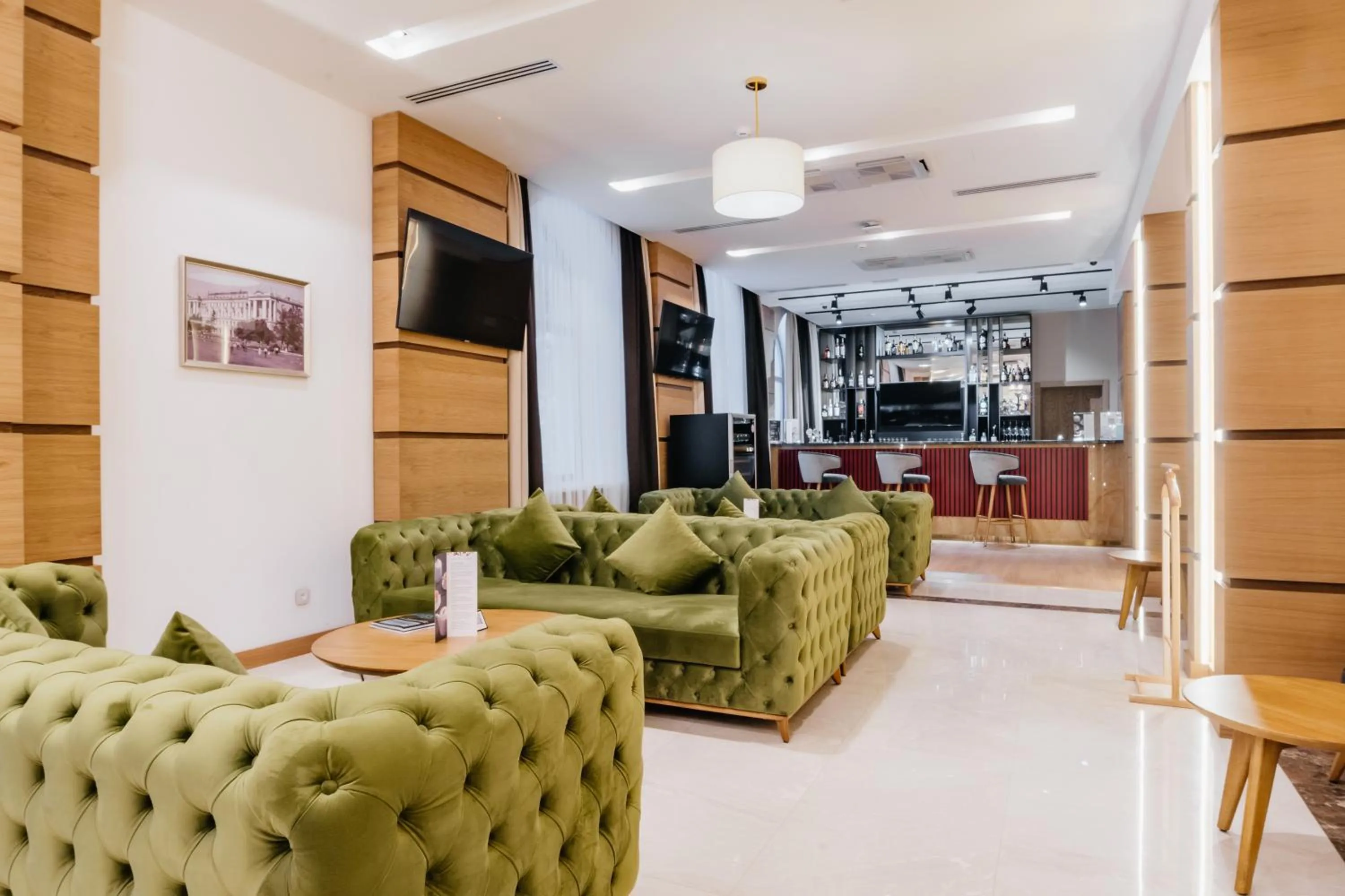 Lounge or bar in Ramada by Wyndham Astana