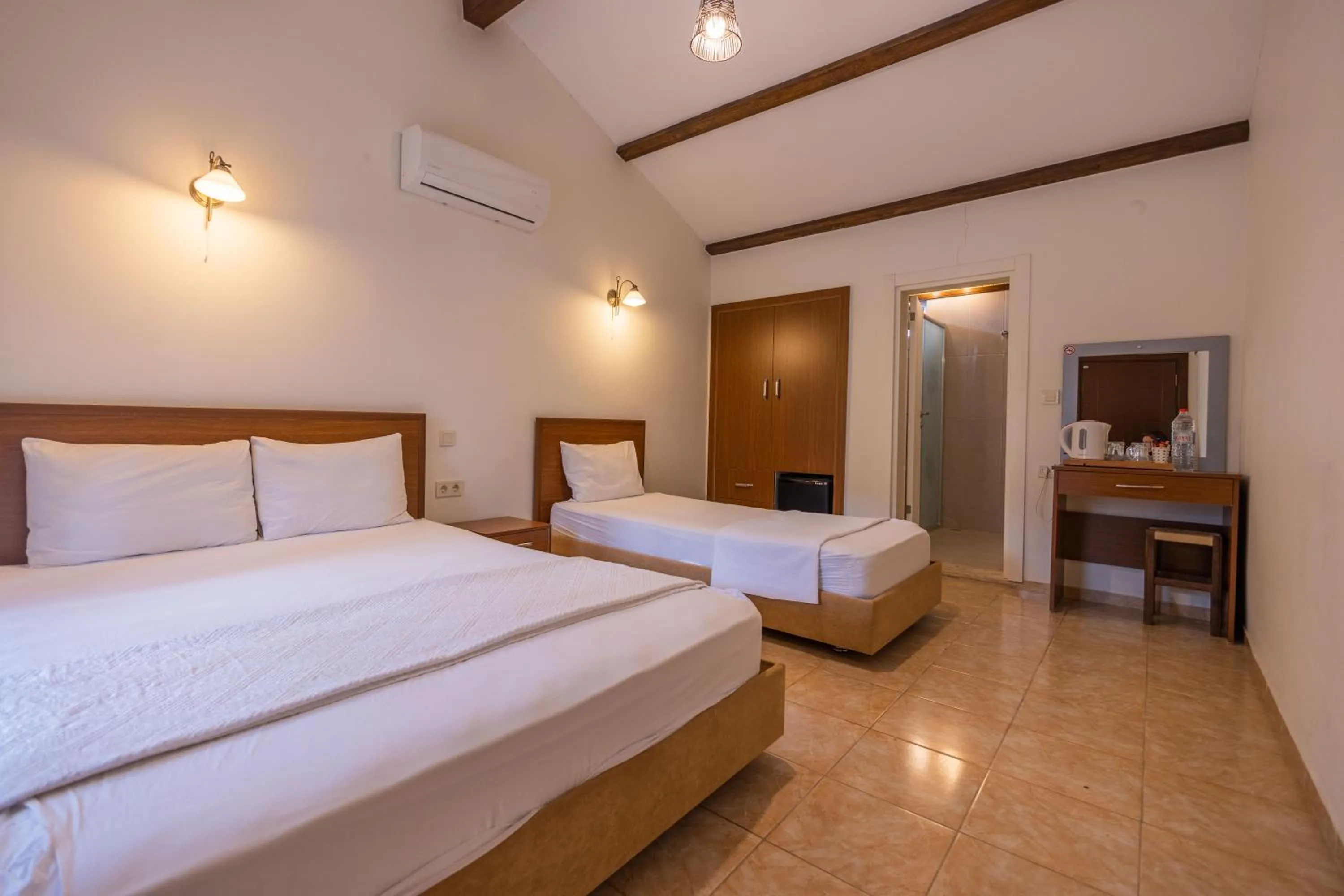 Bed in Caretta Caretta Pension
