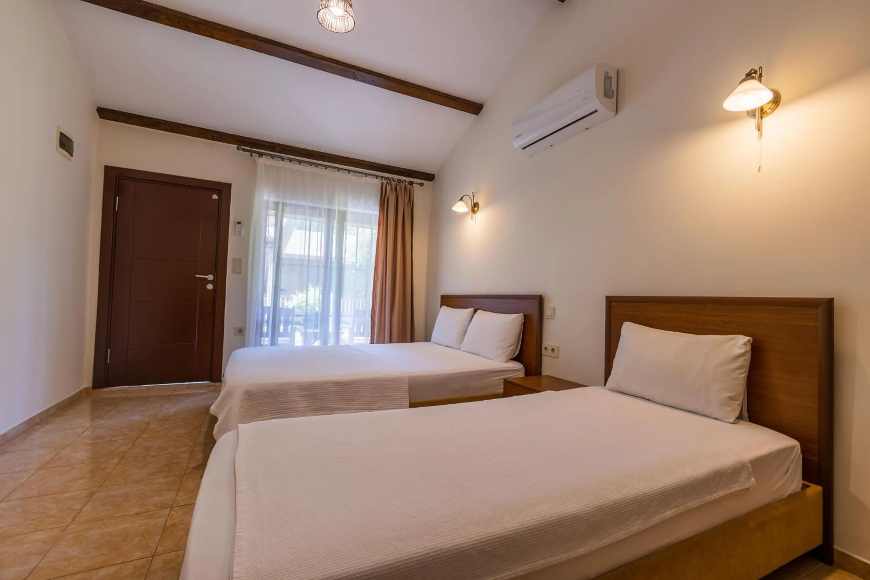 Bed in Caretta Caretta Pension