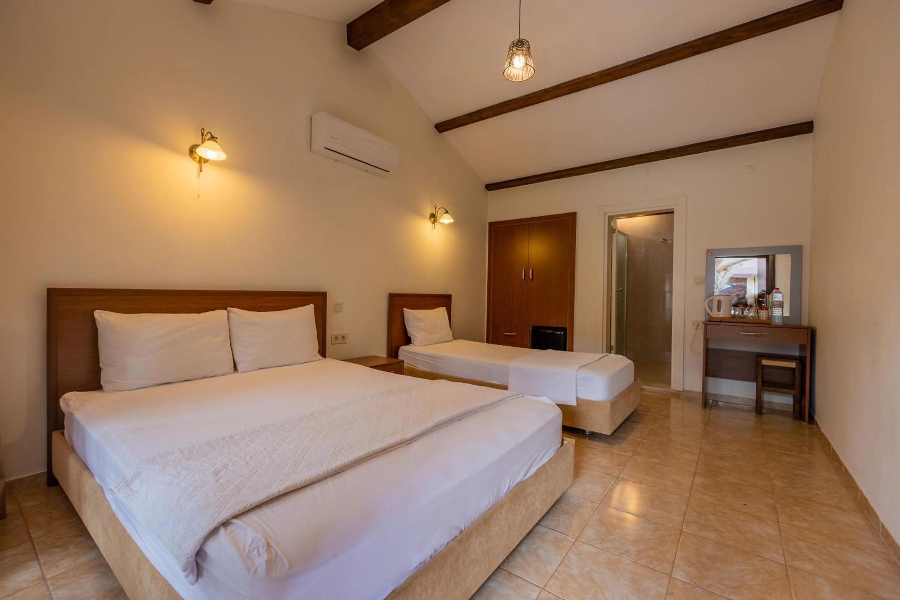 Bed in Caretta Caretta Pension