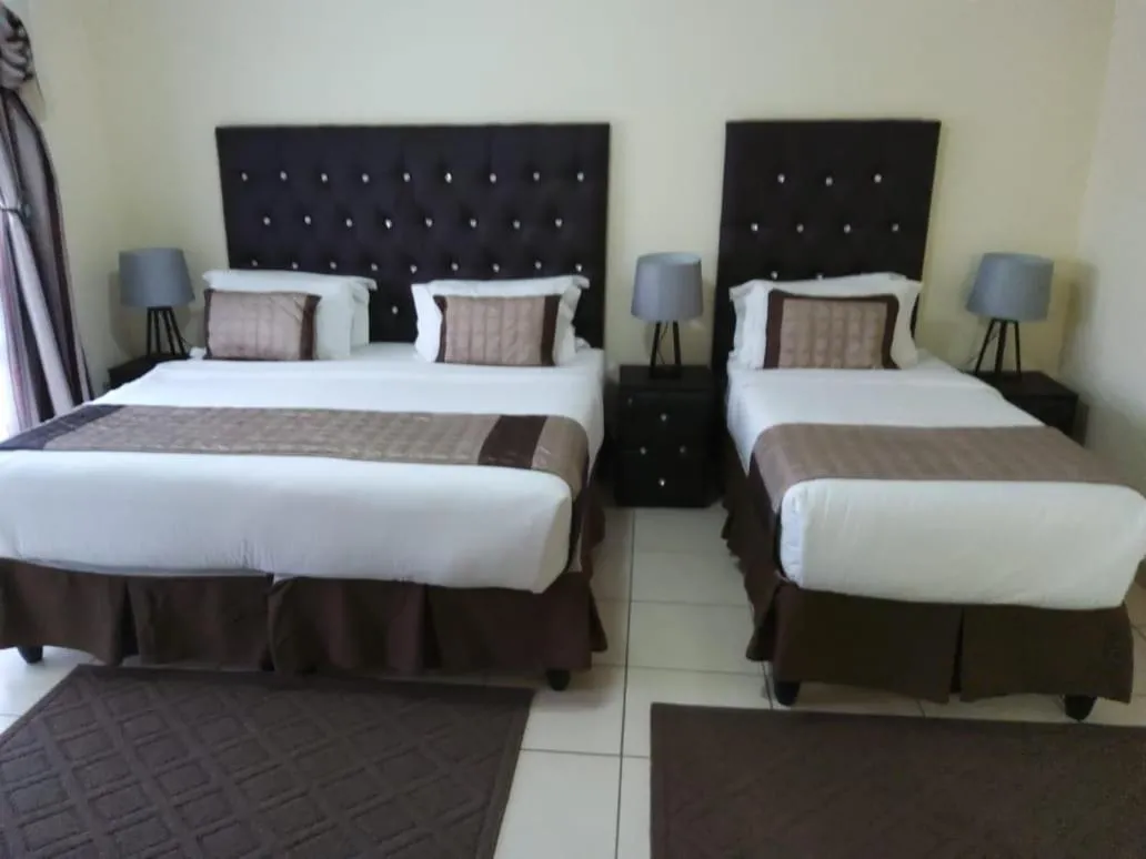 Property building, Bed in Ecotel OR Tambo Airport