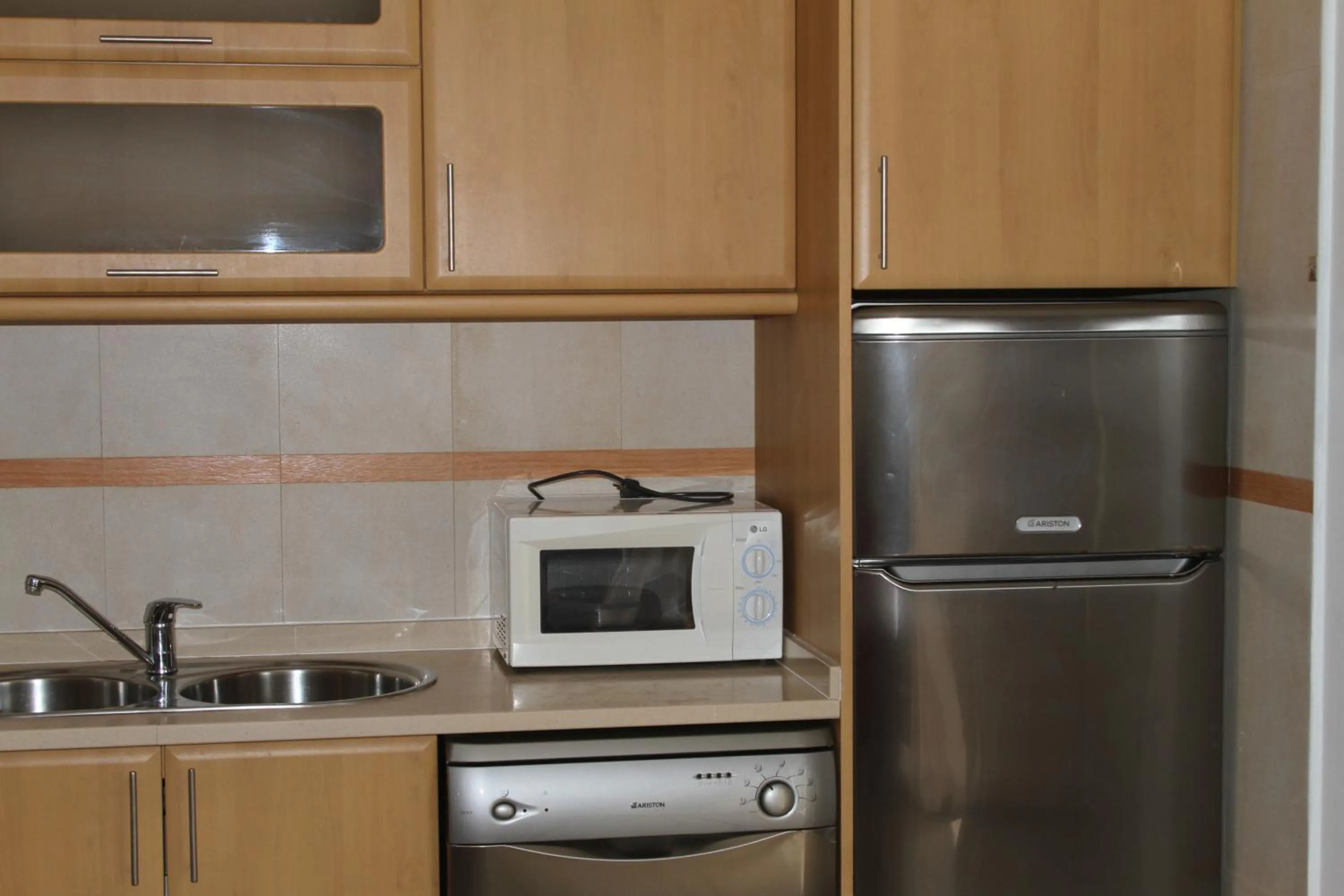 Kitchen or kitchenette in Apartamentos Santa Teresinha