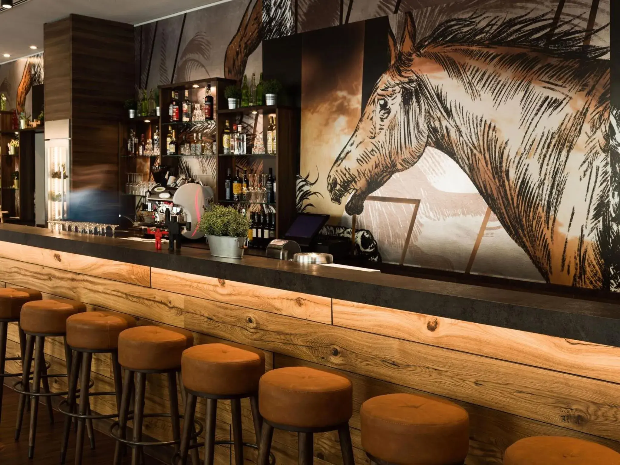 Lounge or bar in Holiday Inn - the niu, Saddle Fürth by IHG Lounge or bar in Holiday Inn - the niu, Saddle Fürth by IHG