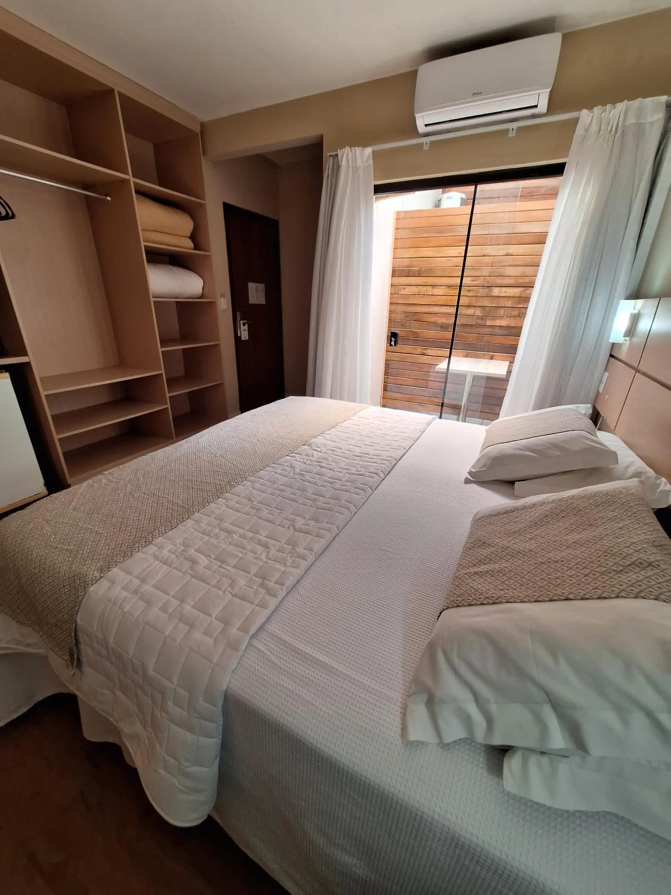 Bed in Hotel Joao de Barro