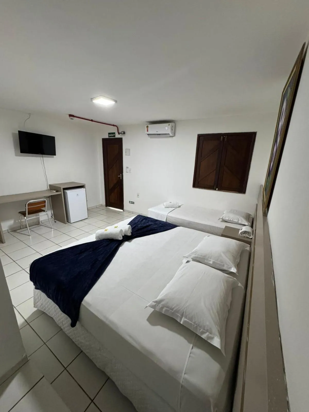 Bed in Pousada Tambaú