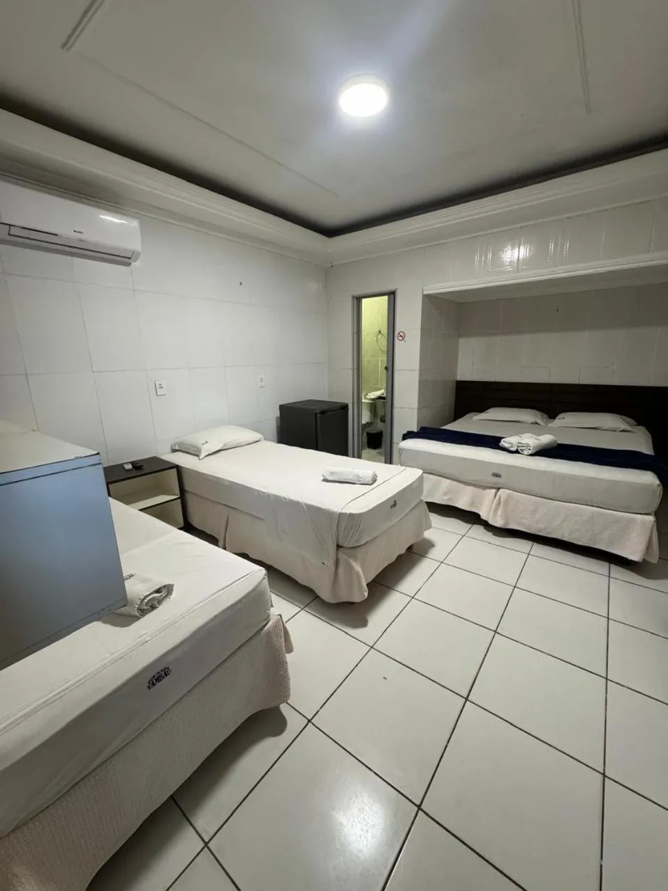 Bed in Pousada Tambaú