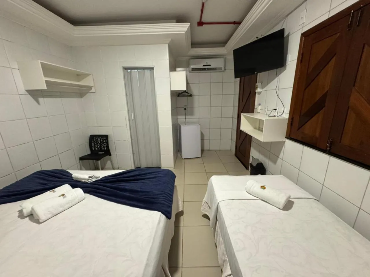 Bed in Pousada Tambaú