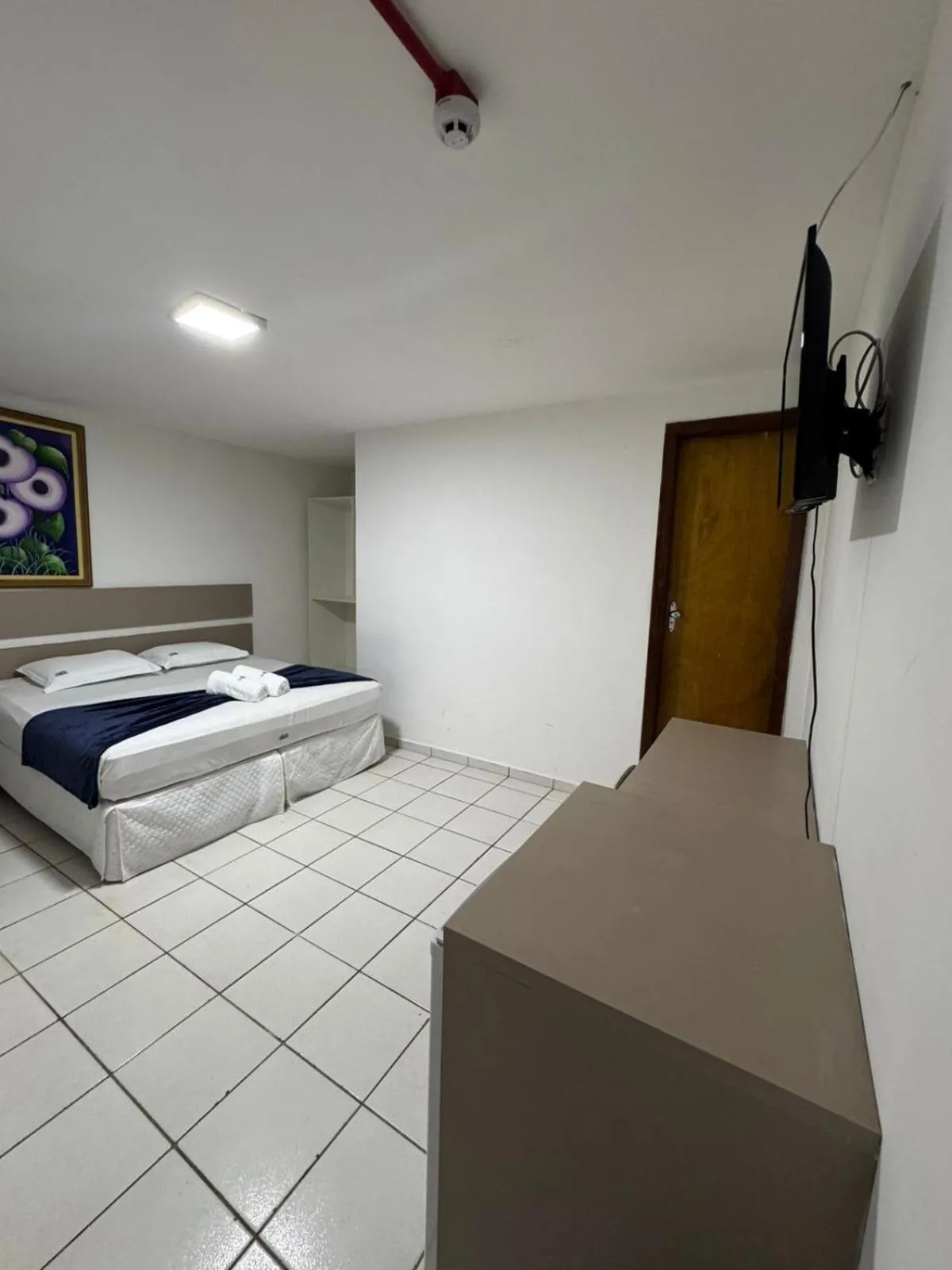 Bed in Pousada Tambaú