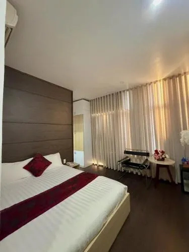 Bed in Phi Long Hotel