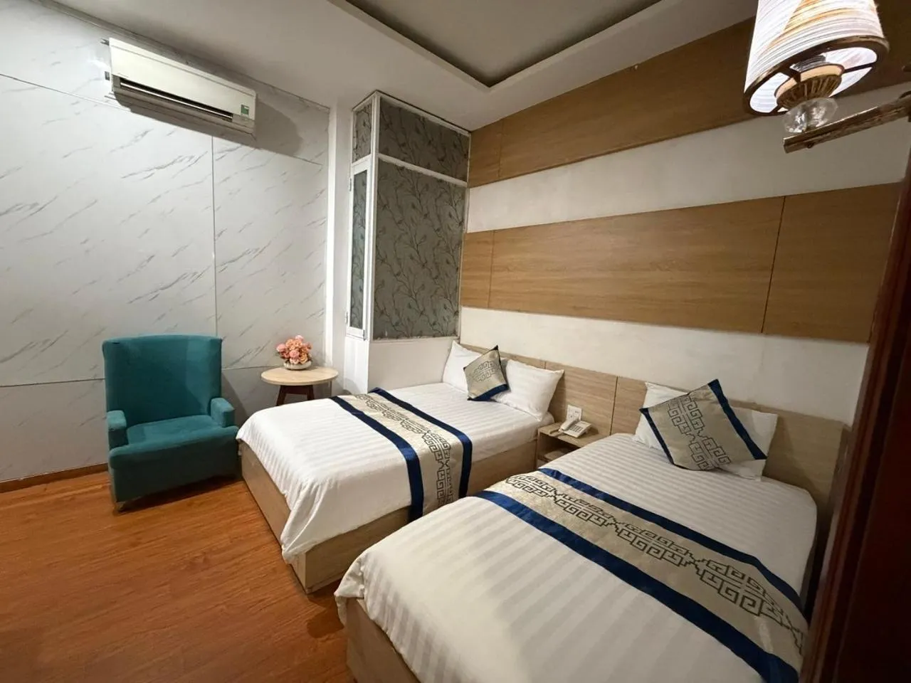 Bed in Phi Long Hotel