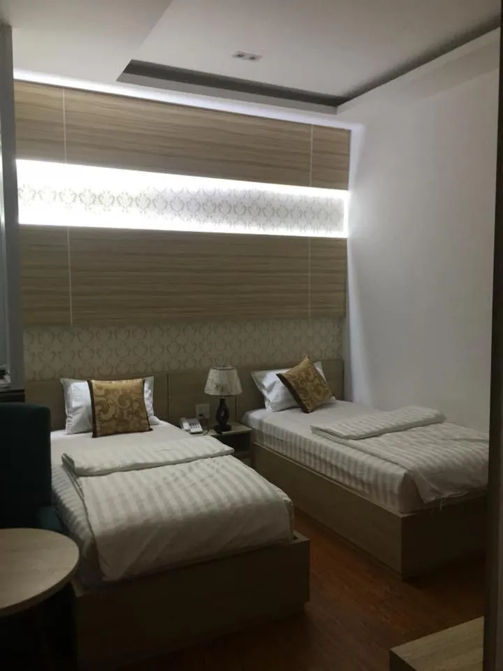 Bed in Phi Long Hotel