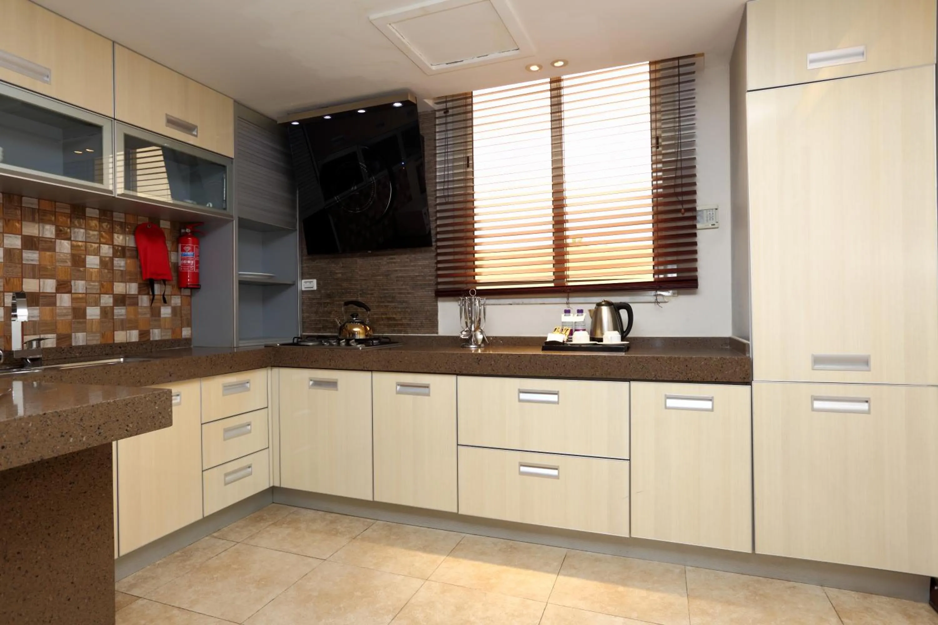 Kitchen or kitchenette in Boudl Gardenia Resort