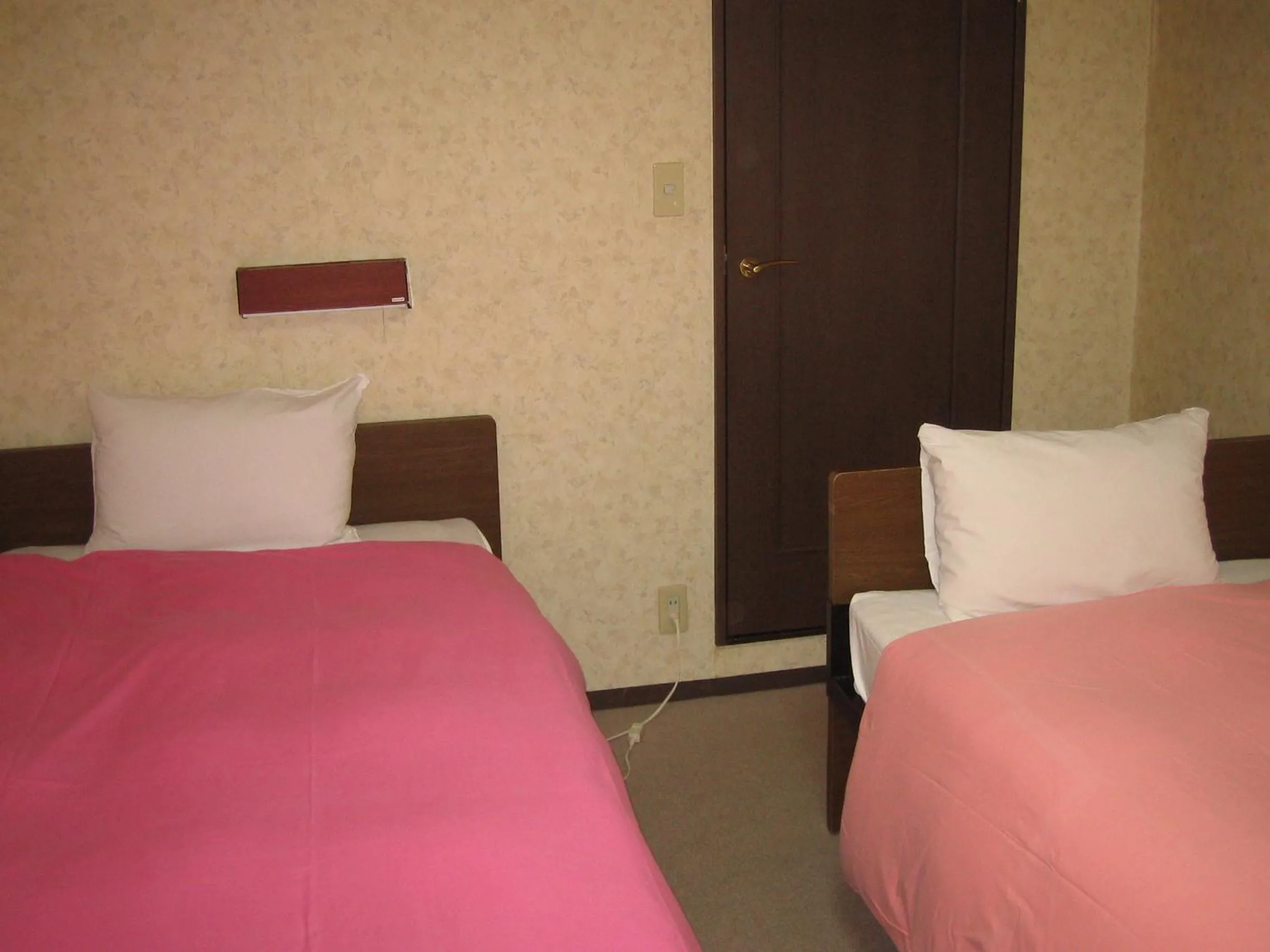 Bed in Sunplaza Rinkai