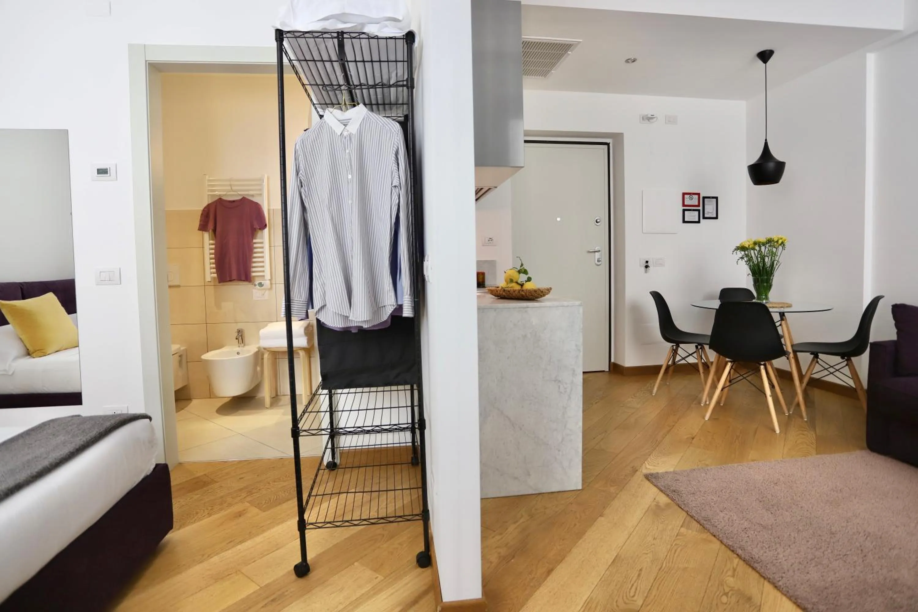 Living room, Bed in Palazzina B - Contemporary Studio