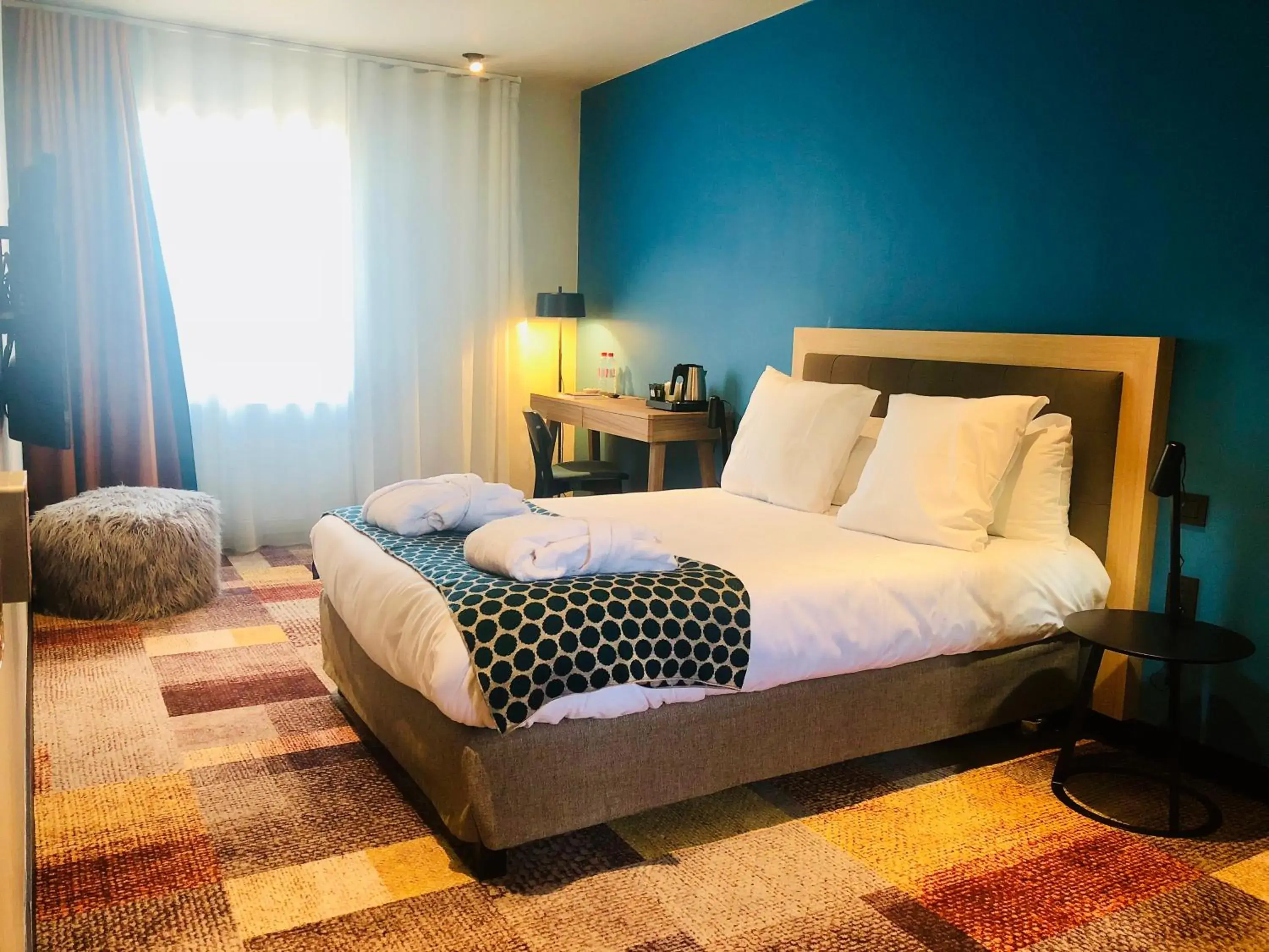 Bed in The Originals Boutique, Hôtel des Sources, Nevers Nord Bed in The Originals Boutique, Hôtel des Sources, Nevers Nord