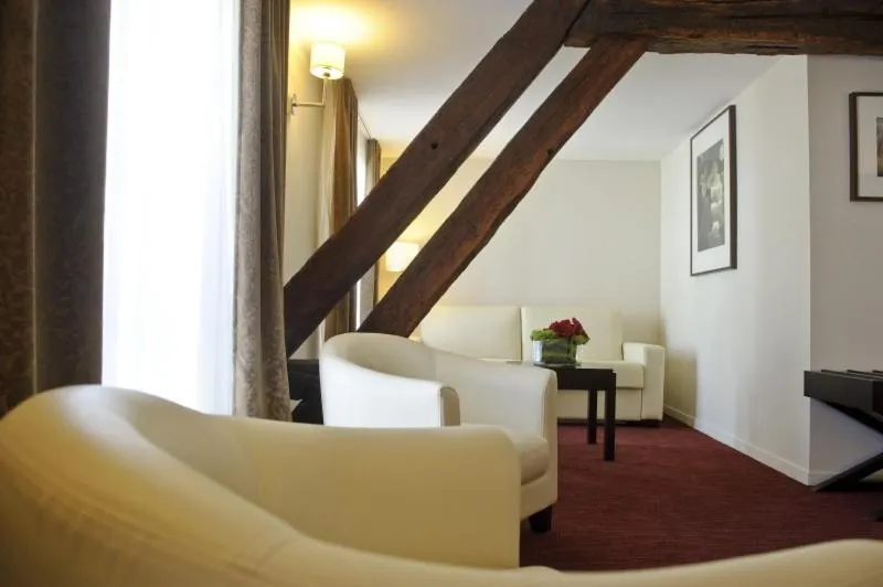 Living room in Hôtel Burgevin